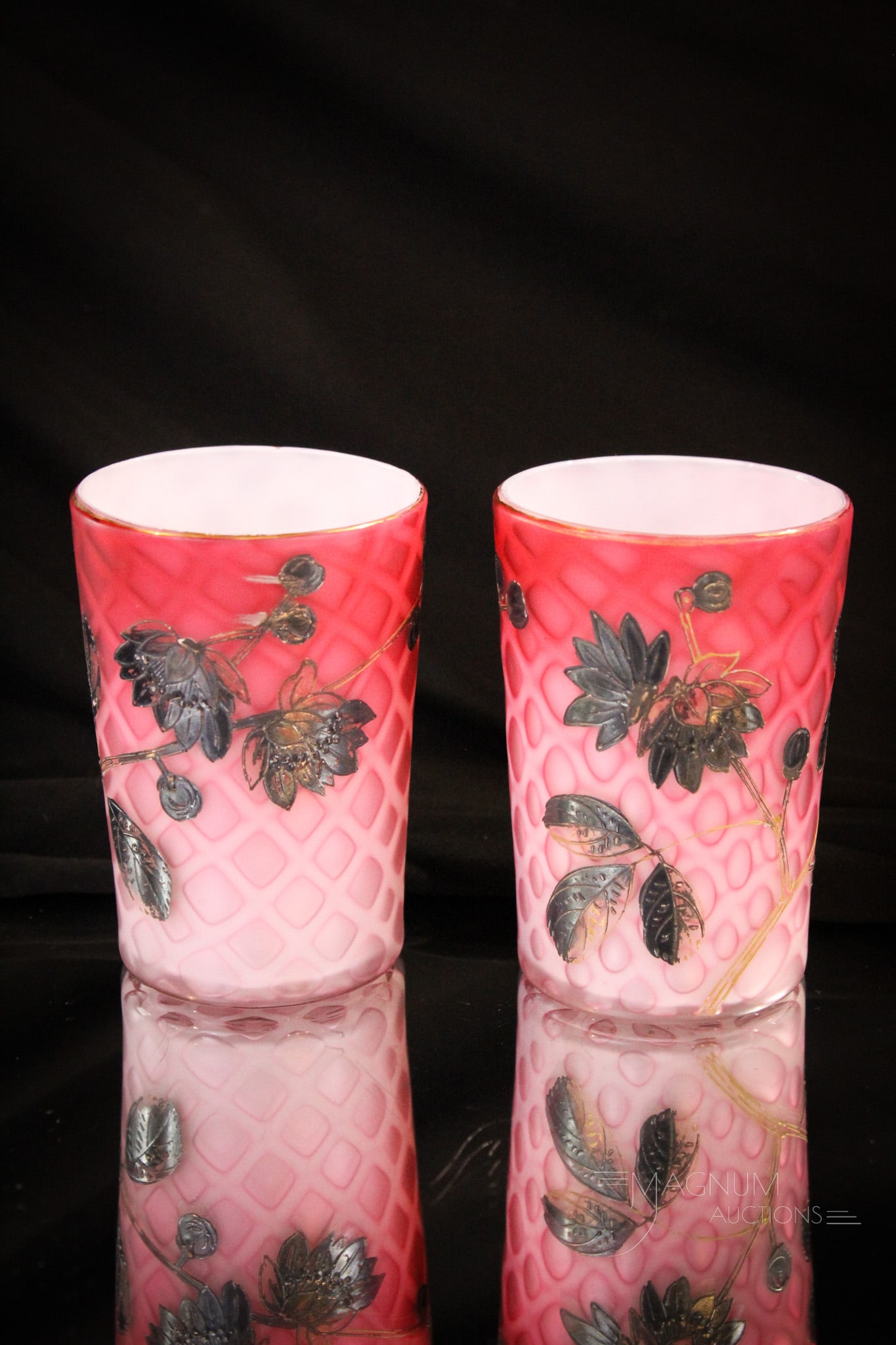 Pair Victorian Enameled Mother of Pearl Satin Glass Tumblers: Perfectly matched pair of Victorian satin glass mother of pearl tumblers in with identical decoration. Each measures 3 3/4" tall.