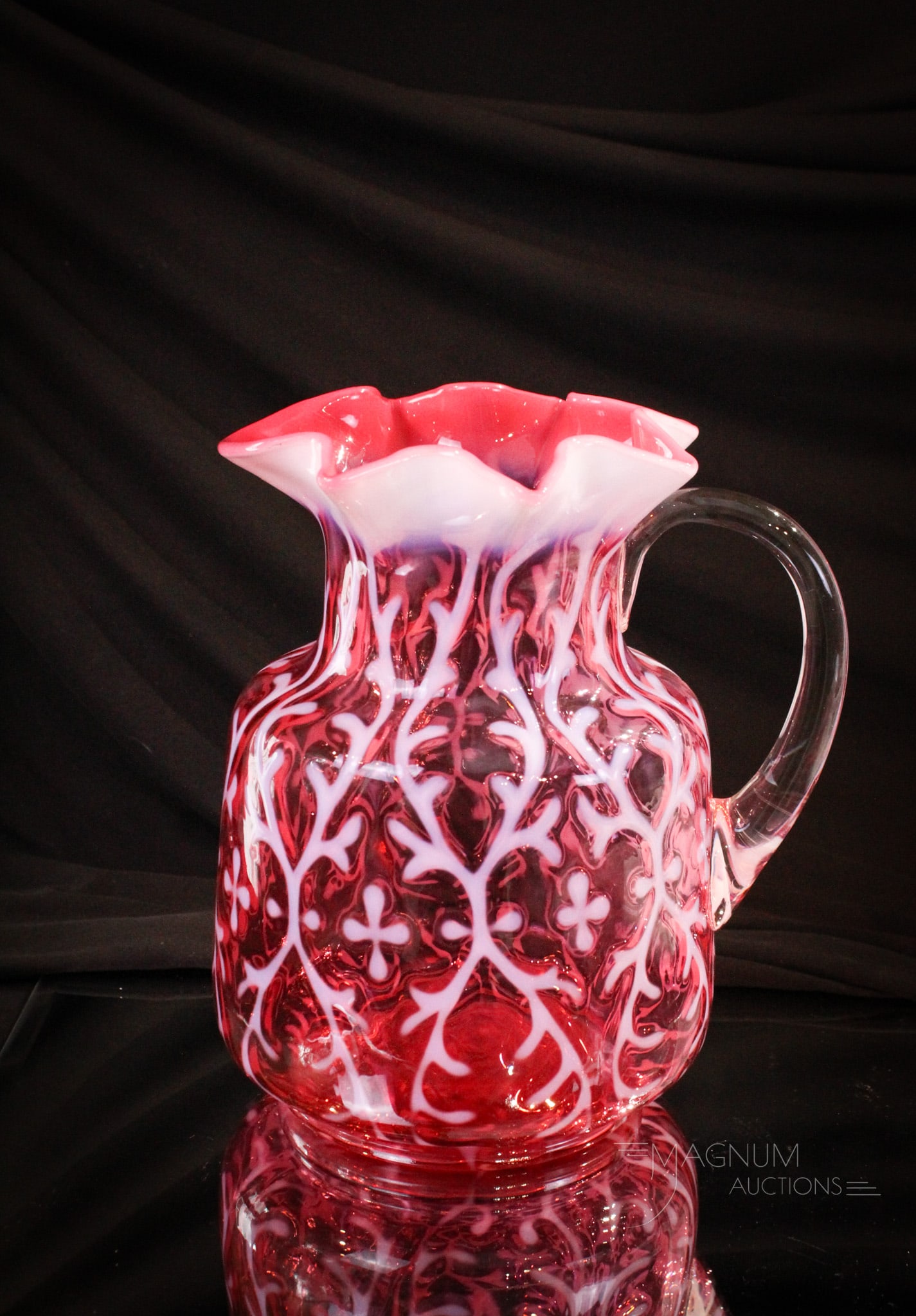 Northwood Cranberry Opalescent Spanish Lace Water Pitcher: Great example if you need one is this cranberry opalescent Spanish Lace pattern Victorian pitcher. This one is in squat mold with star crimped top. Nice color and strong opal around on this one.