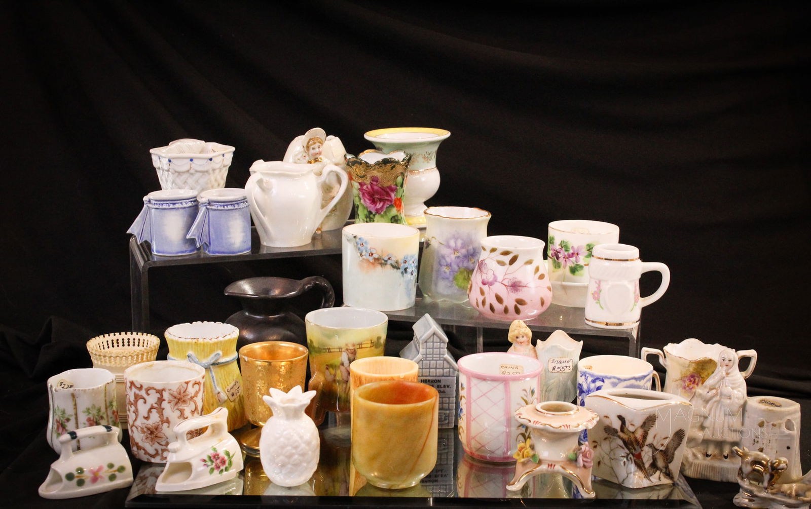 33 pc Lot of Porcelain Collectible Toothpick Holders: Select assortment of thirty three porcelain tootpick holders by various makers. Tallest measures 3".