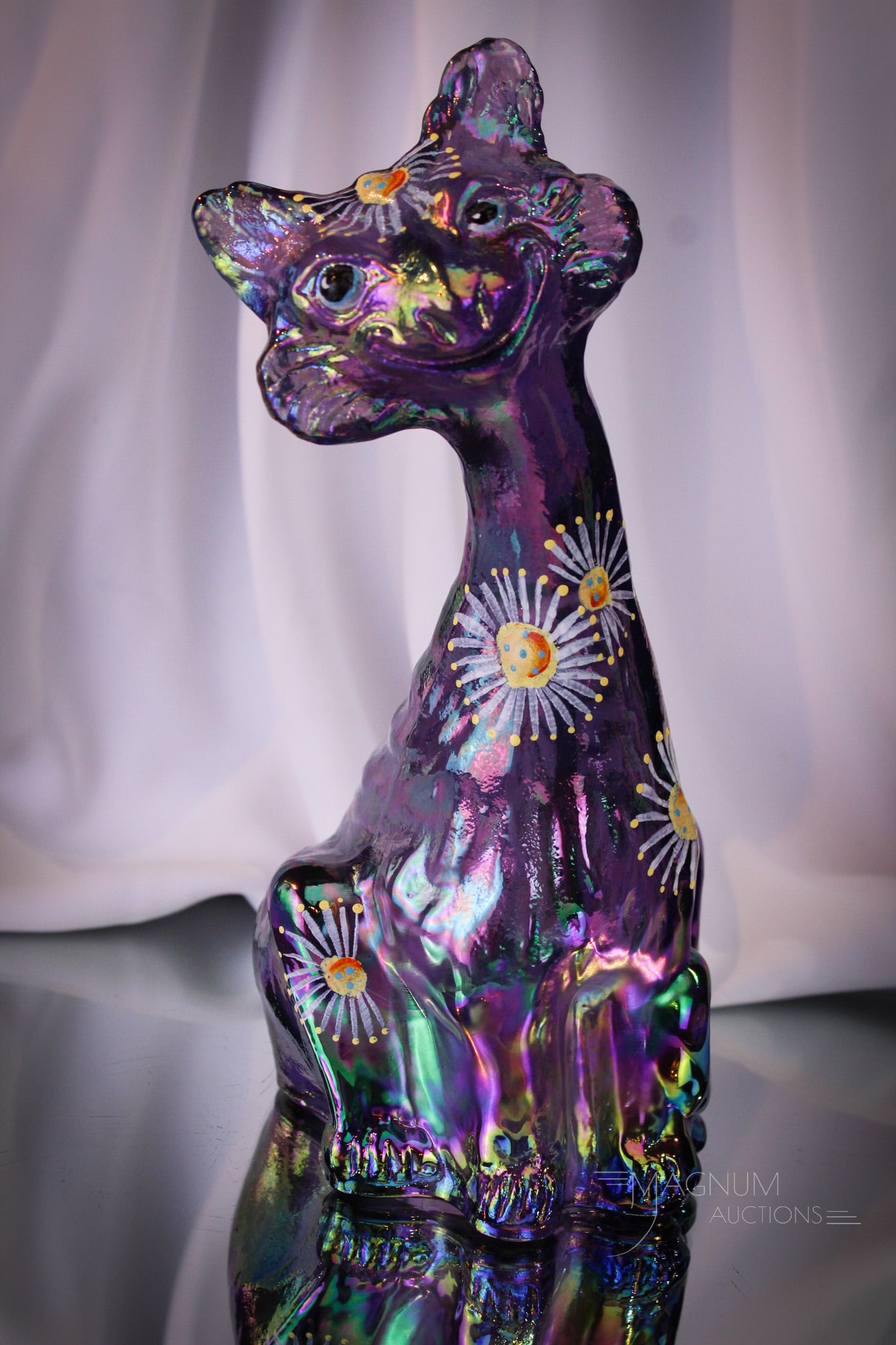 Fenton Glass Alley Cat: Lavender carnival glass Fenton alley cat. This one with hand painted daisies all over the body. Pussy cat measures 10 3/4" tall.