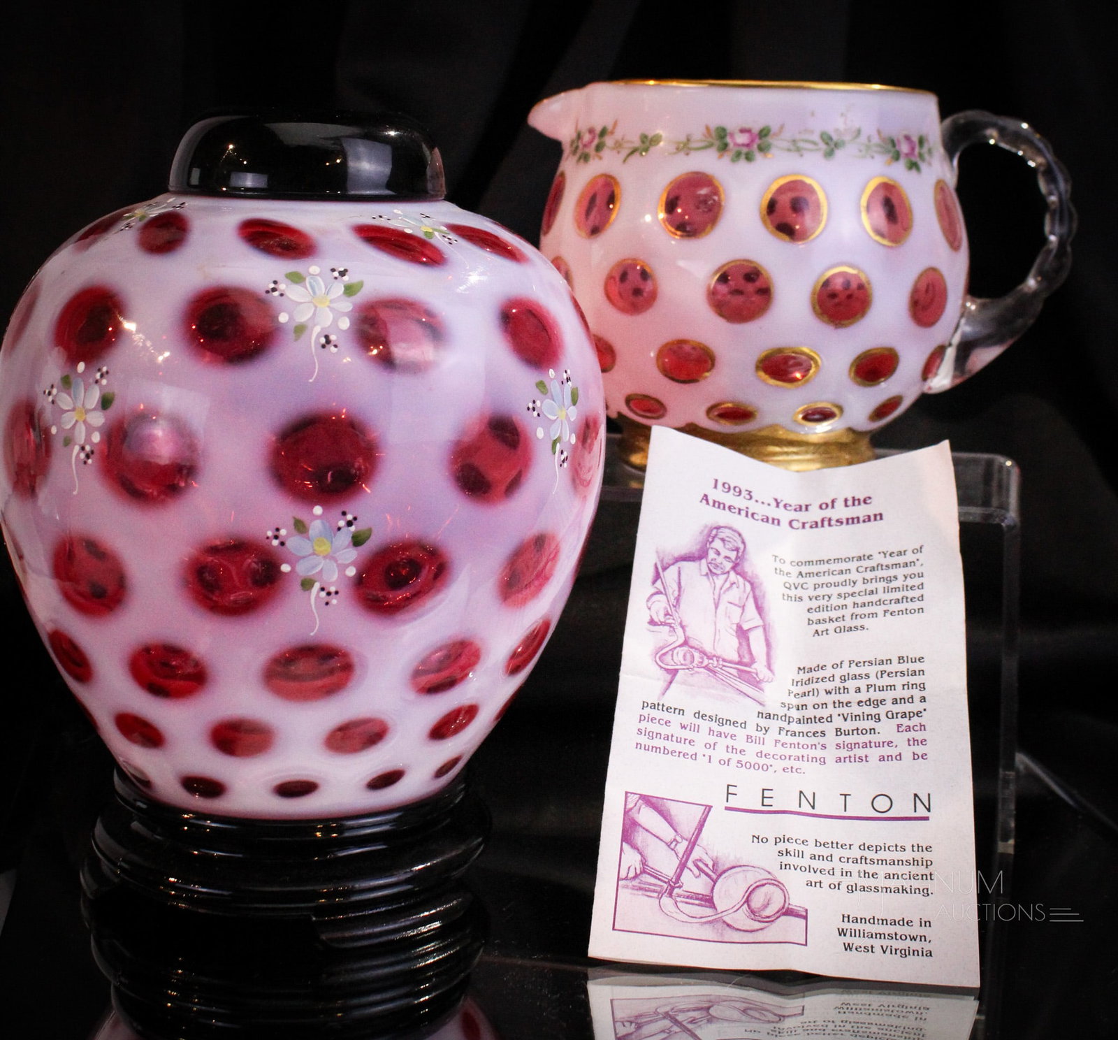 2 pc Lot Fenton Cranberry Opal Coin Dot Charleton Decor: Two fine pieces of Fenton Art Glass in cranberry opal coin dot with Charleton decoration. Lot is comprised of a three piece ginger jar and a squat jug. Tallest measures 8".
