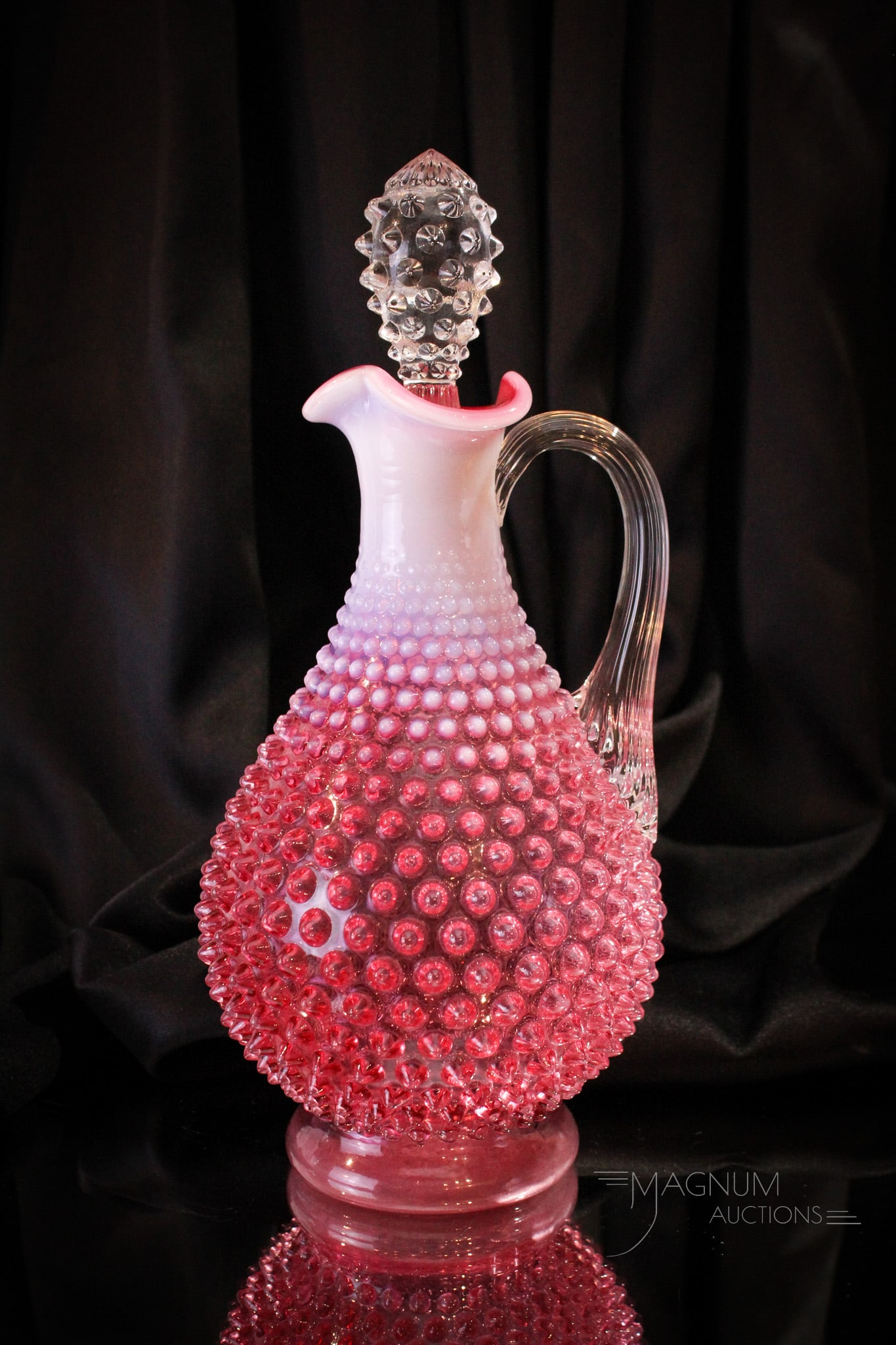 Fenton Cranberry Opalescent Hobnail Decanter: Wonderful Fenton cranberry opalescent hobnail decanter complete with original stopper. It measures 12" tall.