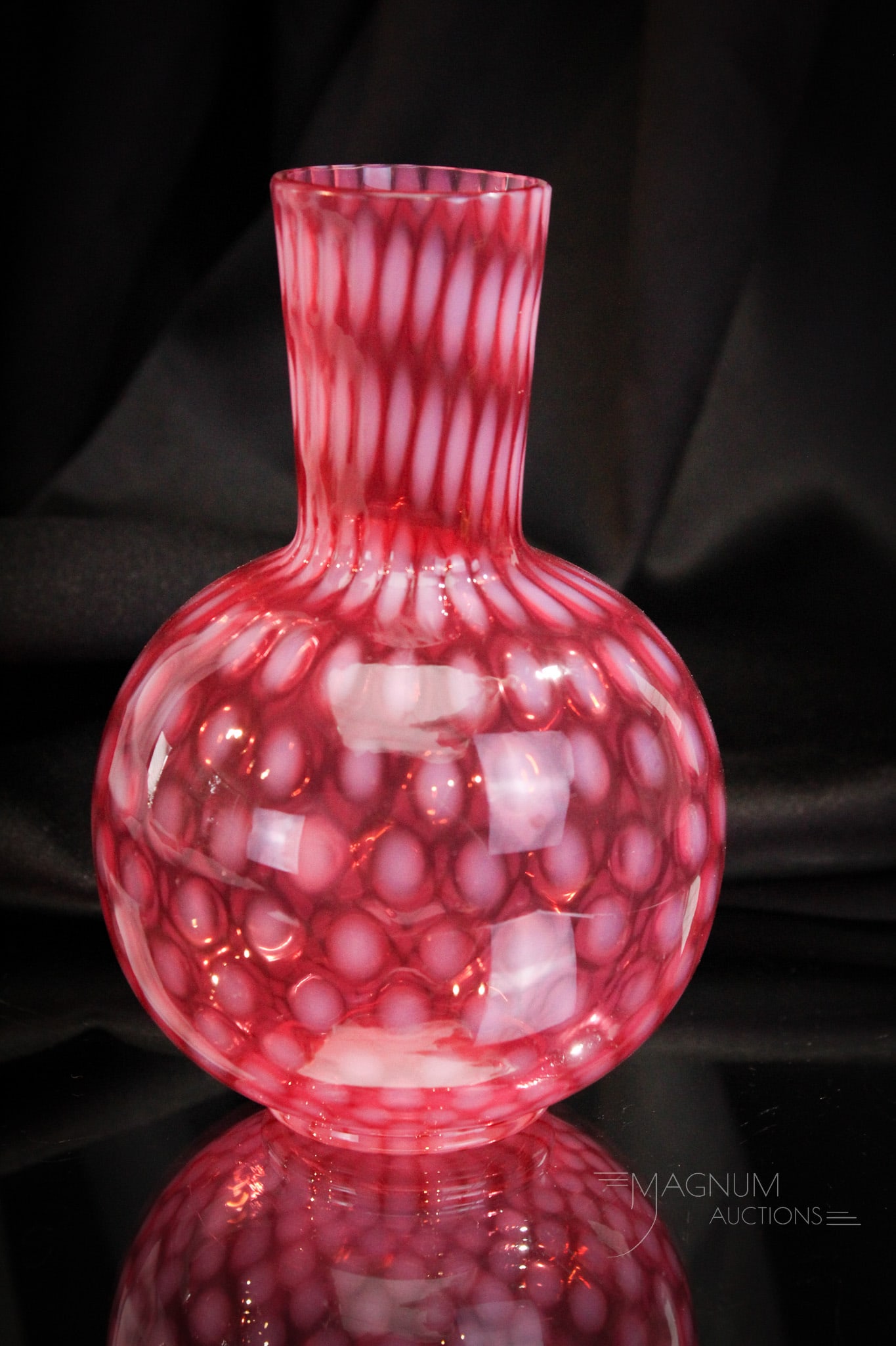 Cranberry Opalescent Craquelle Victorian Water Caraffe: Fine offering here folks! This water caraffe is in cranberry opalescent baby coinspot with craquelle exterior finish. So seldom seen. It measures 6 1/2" tall.