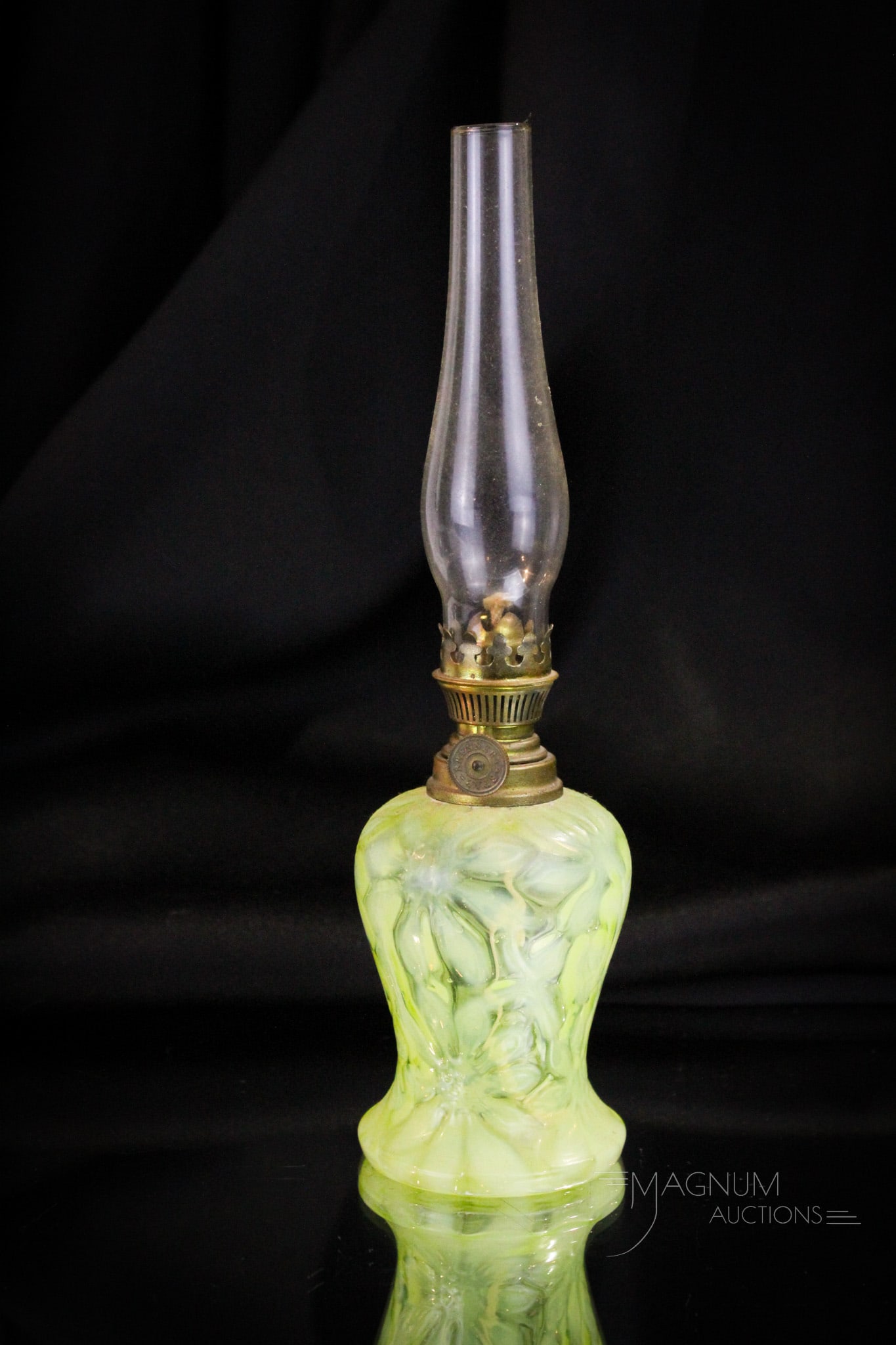 Victorian Vaseline Opalescent Miniature Oil Lamp: Fine find in this Victorian vaseline opalescent floral pattern miniature oil lamp base. Lamp base features burner and comes complete with chimney. Nice and tough to find piece. Measures 3 1/.2" tall t