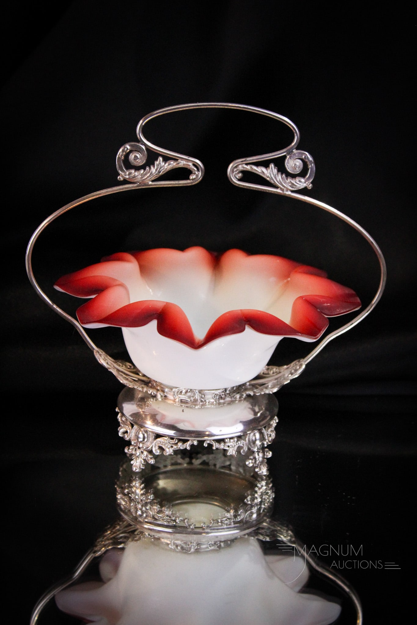 Homan Victorian Silverplate Miniature Webb Brides Basket: Beautiful Victorian Webb oxblood ombre' bowl set in signed Homan silverplate frame. Great example of a miniature brides basket. Piece measures 7" tall, 7 1/4" wide.
