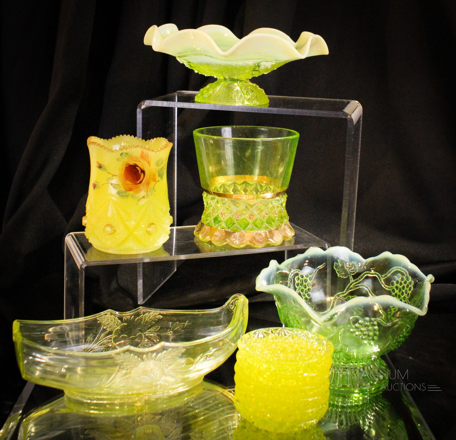 11 pc Lot Vaseline Glass: Fine selections in vaseline glass to delight. The luscious lot is comprised by two opalescent bowls, a rose sprig canoe, six Daisy & Button pattern butter pats and more! Something sure to please.