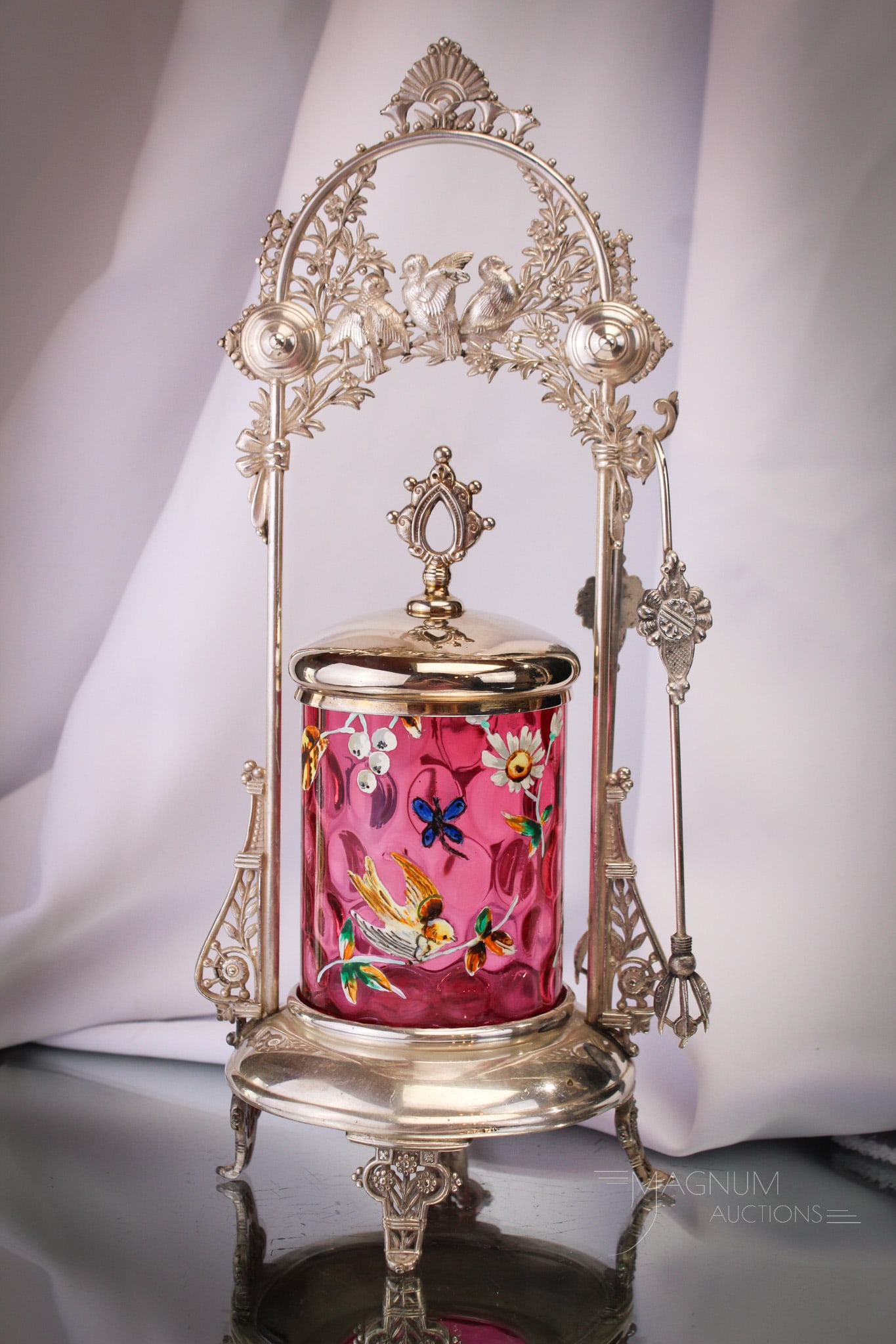Meriden Victorian Enameled Glass Victorian Pickle Castor: Gorgeous cranberry enameled pickle jar setting in signed Meriden Victorian silverplate holder. This fantastic castor measures a whopping 13 1/2" tall. Fine offering to say the least.