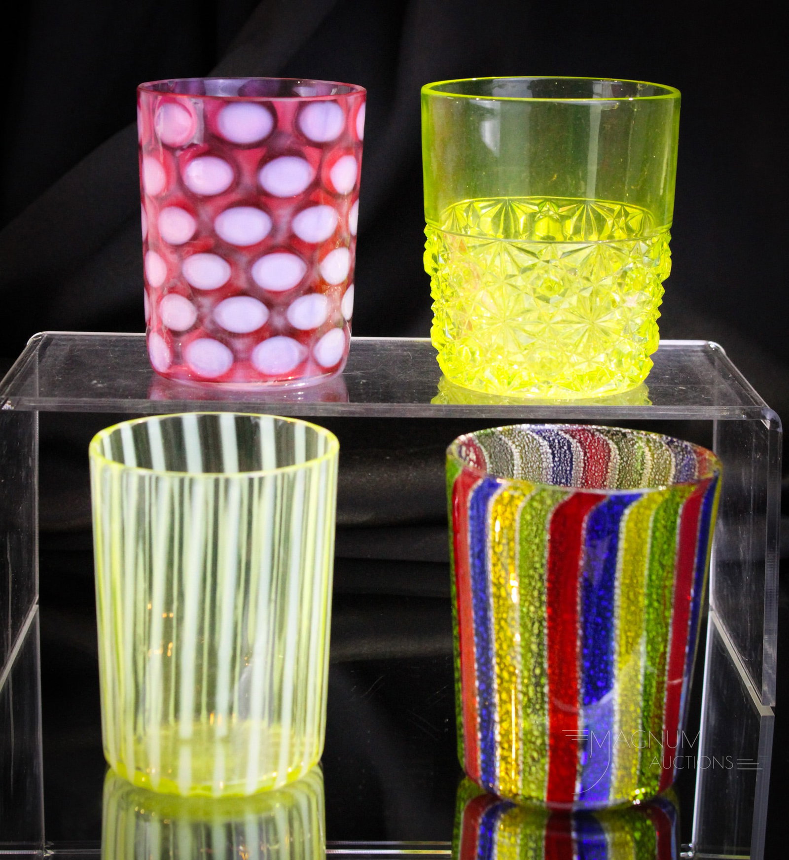 4 pc Lot Art Glass Tumblers Vaseline Italian Victorian & More: Nice offering of four Victorian Vaseline glass tumblers. Lot is comprised of a Fenton for L. G. Wright cranberry opalescent coindot with a minor in the making inner rim flake, an Italian Ribbon mica e