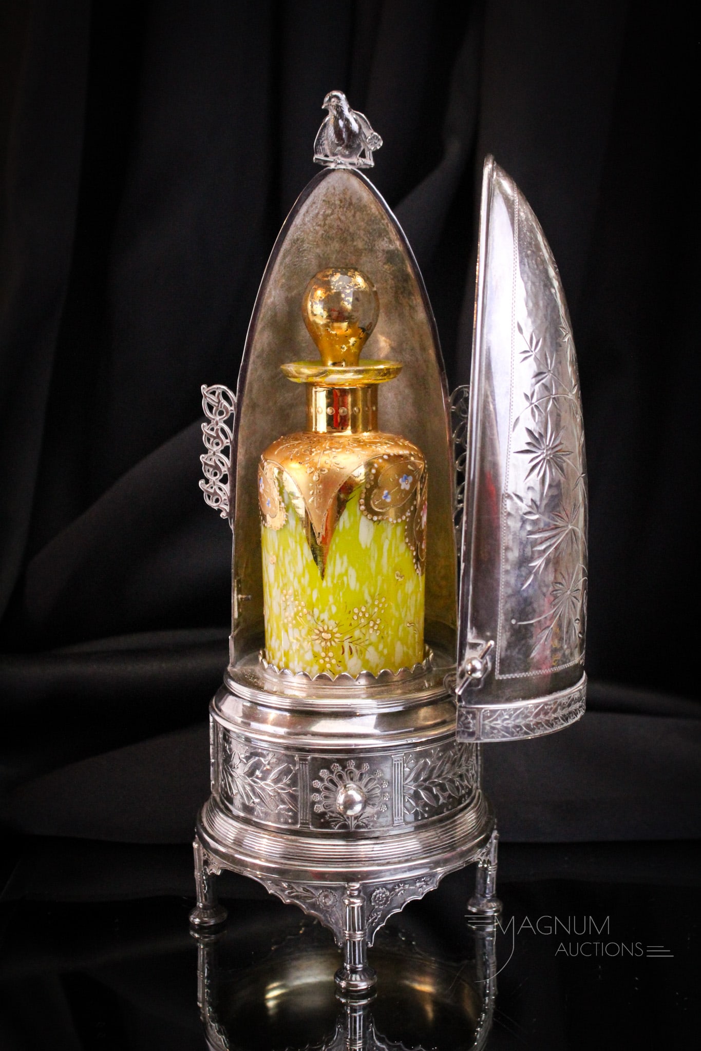 Reed & Barton Victorian Silverplate & Glass Perfume Jewelry Castor: Amazing Victorian signed Reed & Barton silverplate jewelry and perfume castor complete with Moser perfume bottle. This fine piece features bird finial. The Moser perfume bottle is in yellow spatter gl
