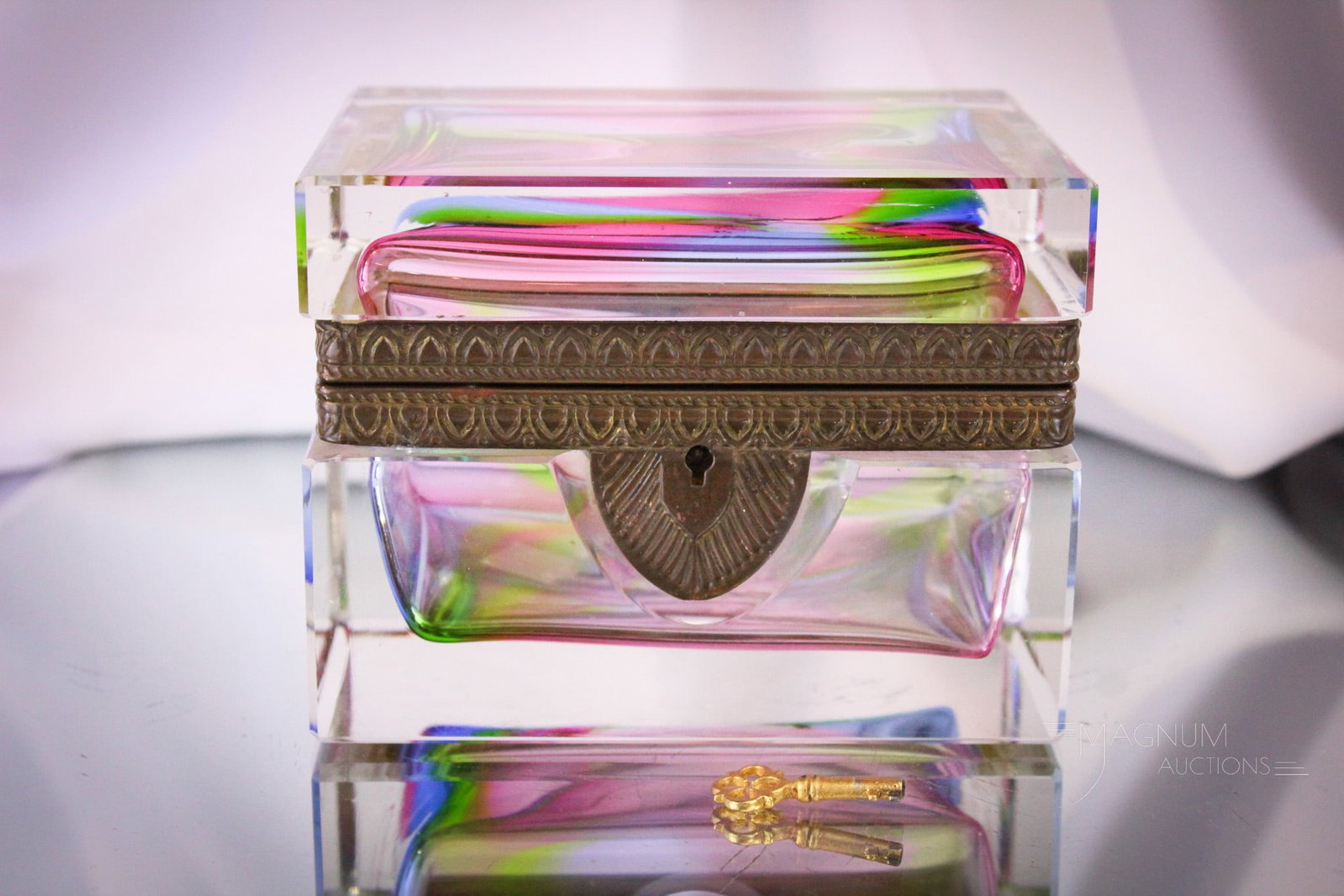 Rainbow Art Glass Jewelry casket: Gorgeous dahling. Just gorgeous. This rainbow art glass jewelry casket comes complete with key. Amazing piece to say the least. Casket measures 3 3/4" tall, 5" long.