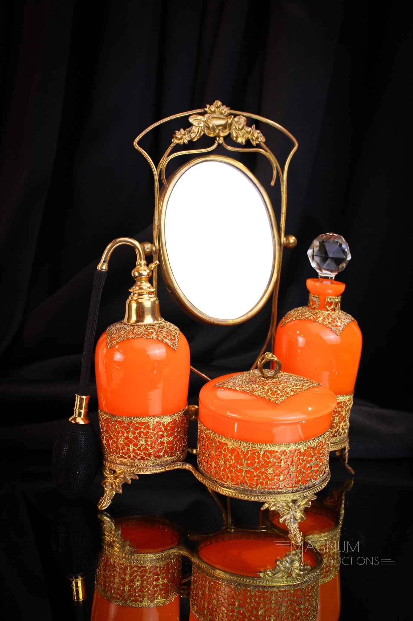 Antique Czech Glass Perfume Vanity Set in Ormulu Frame: Fine Czech Glass Perfume Vanity set in ormuly frame. Set is complete with perfume, lidded powder jar, and atomizer. Frame has mirror. Complete set measures 10 3/4" tall. Powder jar base with chip to r