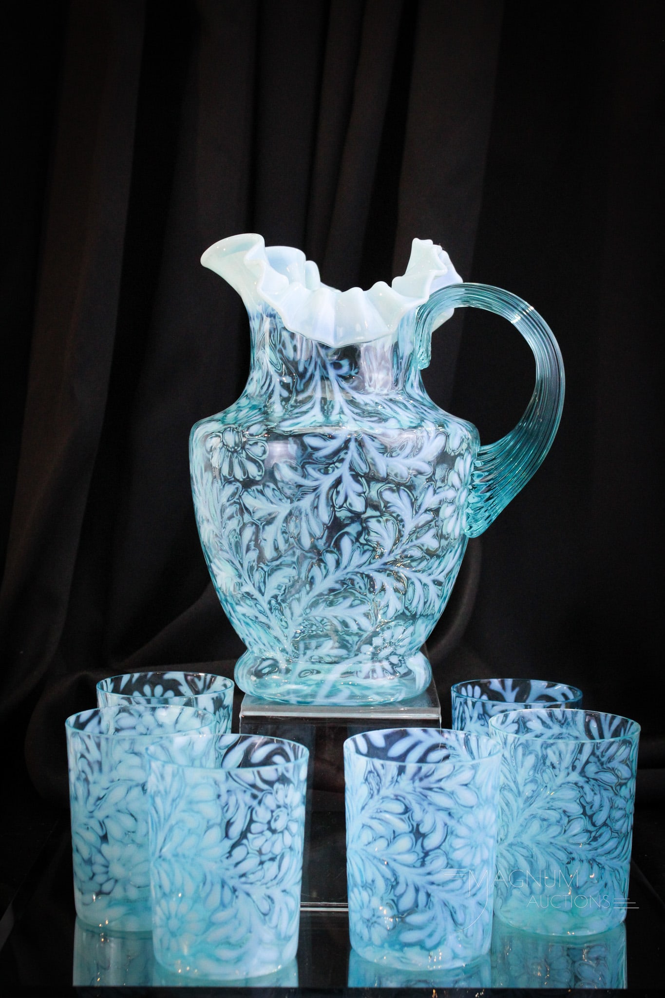 7 pc Northwood Blue Opalescent Daisy & Fern Victorian Water Set: Great example of a complete Northwood blue opalescent Daisy & Fern pattern water set. Set includes pitcher and six tumblers. Tallest measures 9 1/2". Two tumblers exhibit minor nips on rim possibly as