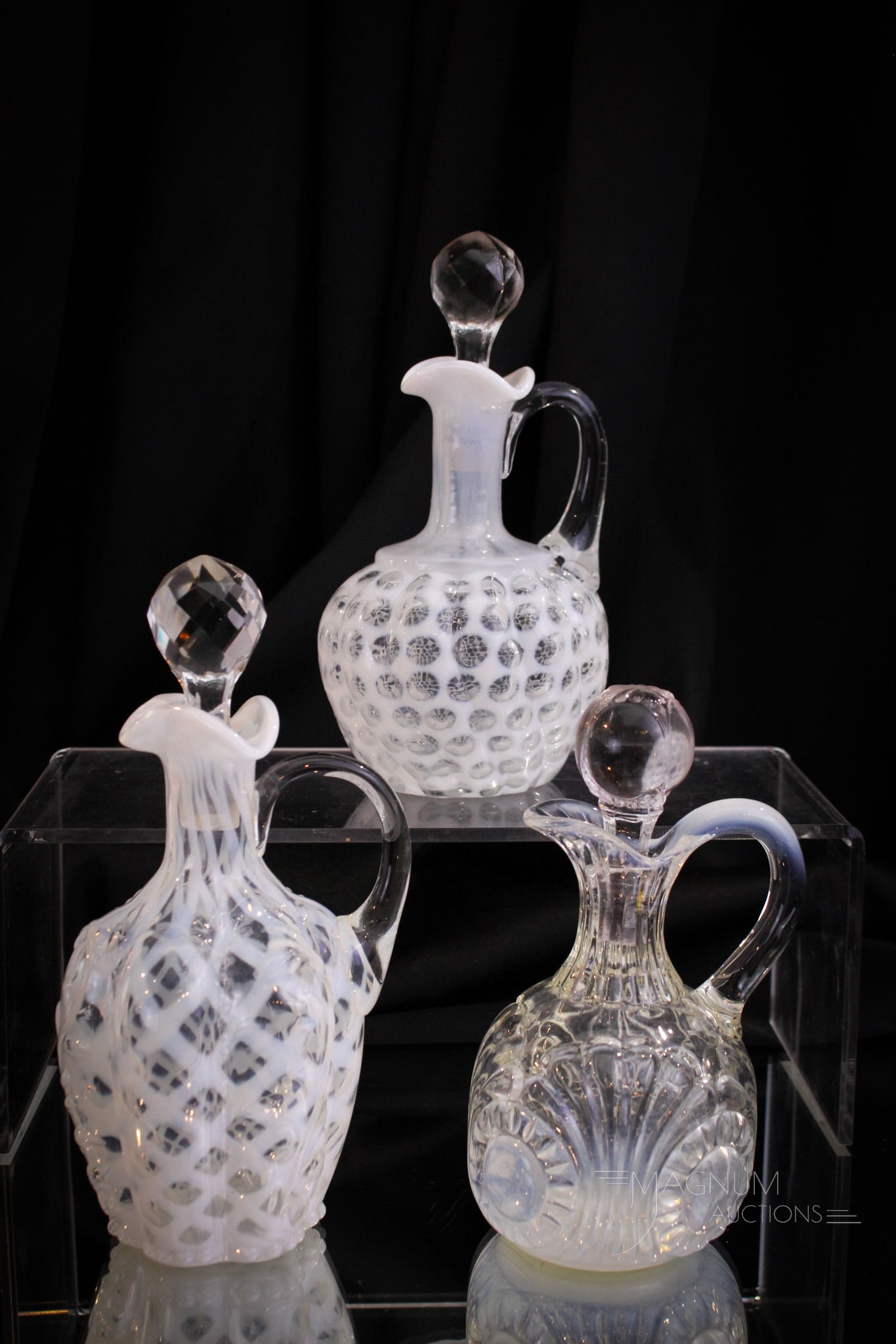 3 pc Lot Victorian Glass Cruets Northwood Hobb's & More: Three perfect examples of opalescent Victorian cruets. Included in the lot is a Tokyo by Jefferson, a Windows by Hobb's, and completed by a panelled Sprig with lattice by Northwood. Tallest measures 7