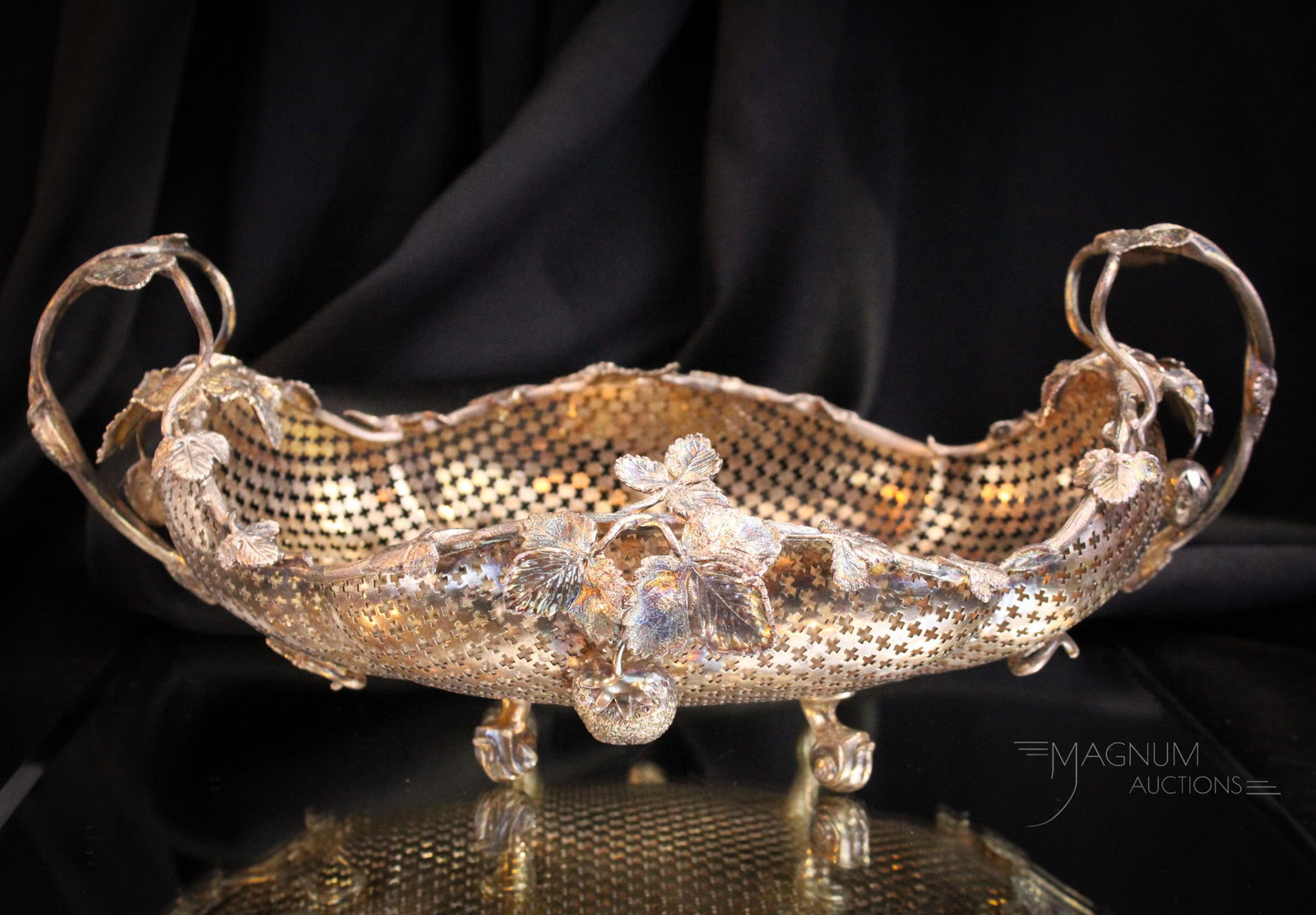 Victorian Silverplate Reticulated Centerpiece: Pass the dinner rolls please! Yes, if not in need of a centerpiece, use it for dinner rolls at your next family gathering. This beauty is adorned with strawberries and trailing vines. Reticulated desi