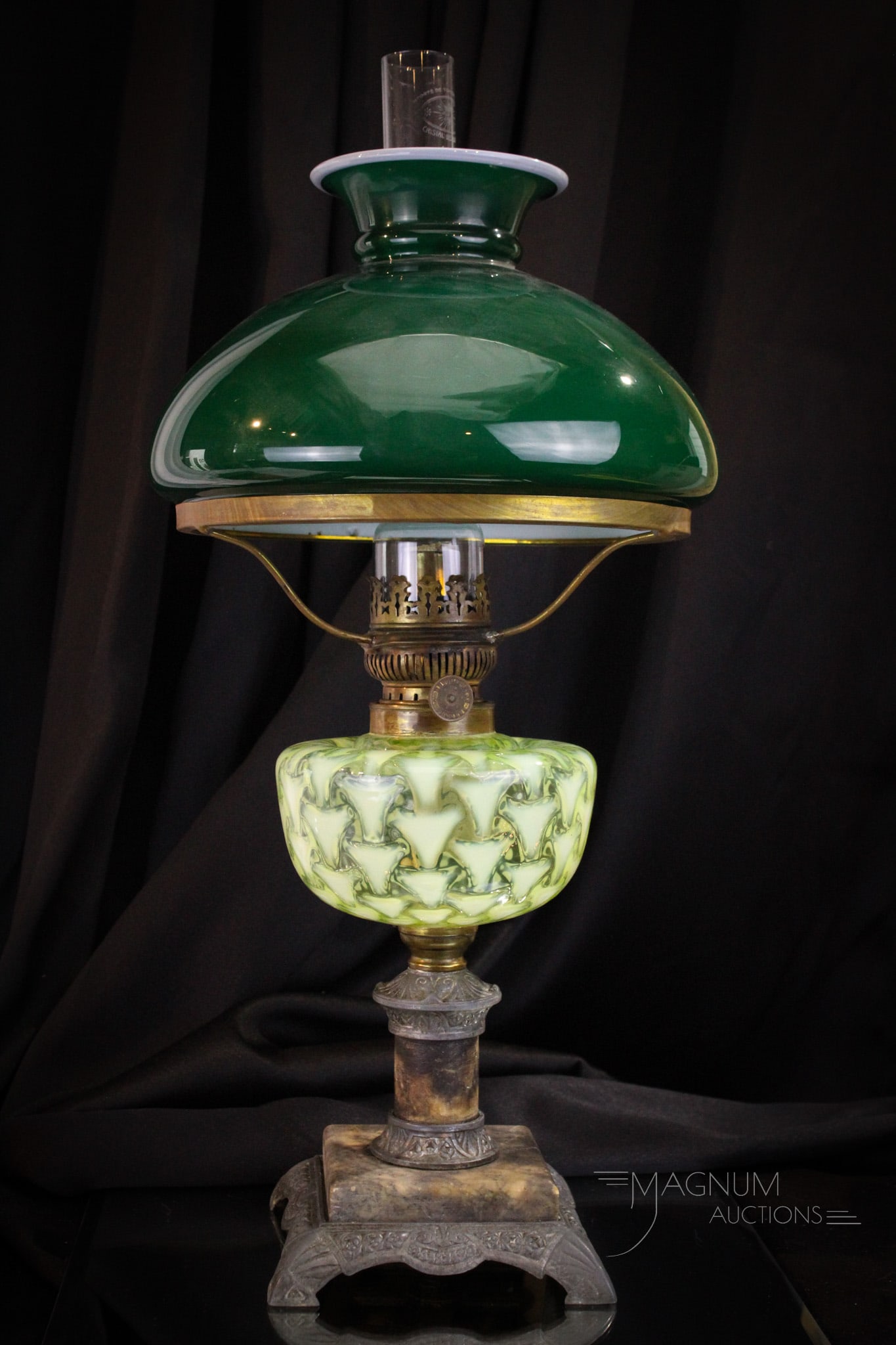 Vaseline Opalescent Victorian Glass Shark Tooth Oil Lamp: Fine offering of a Victorian vaseline opalescent Shark Tooth pattern complete with emeralite shade. Lamp Measures 9 1/4" tall to the burner collar and 20" tall to the top of the shade. Nice example.