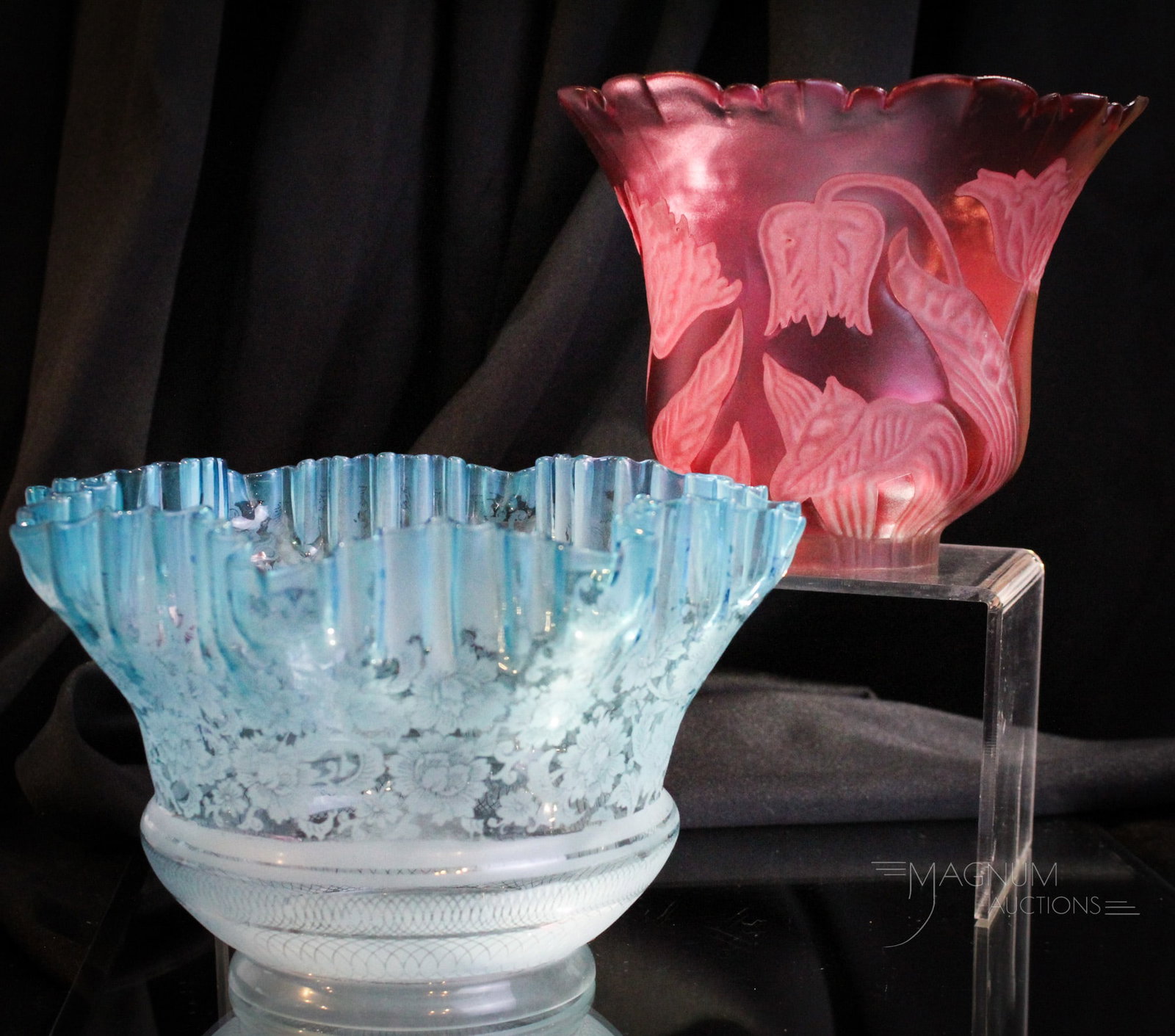 2 pc Lot Victorian Cranberry & Blue Etched Art Glass Shades: Nice pairing of two Victorian art glass shades. The first a cranberry embossed and frosted shade. It measures 5 1/2" tall,7" wide, and a 2 1/2" fitter. The second a blue etched glass. This shade measu