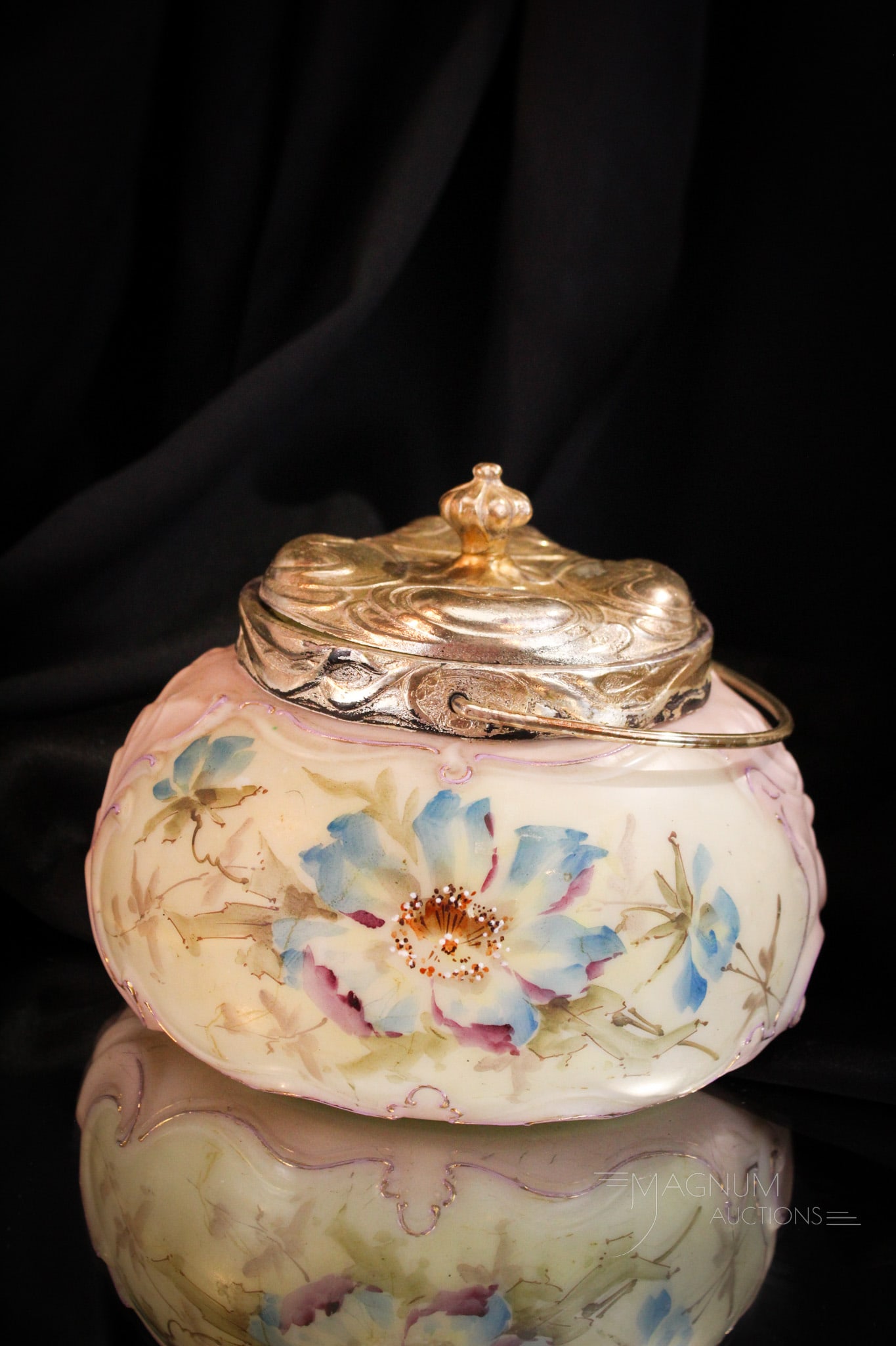 Victorian Wavecrest Glass Embossed Biscuit Jar: Wonderful attributed to Wavecrest floral decorated biscuit jar complete with original mountings. Fine example. Biscuit jar measures 5 1/2" tall, 7" in diameter.