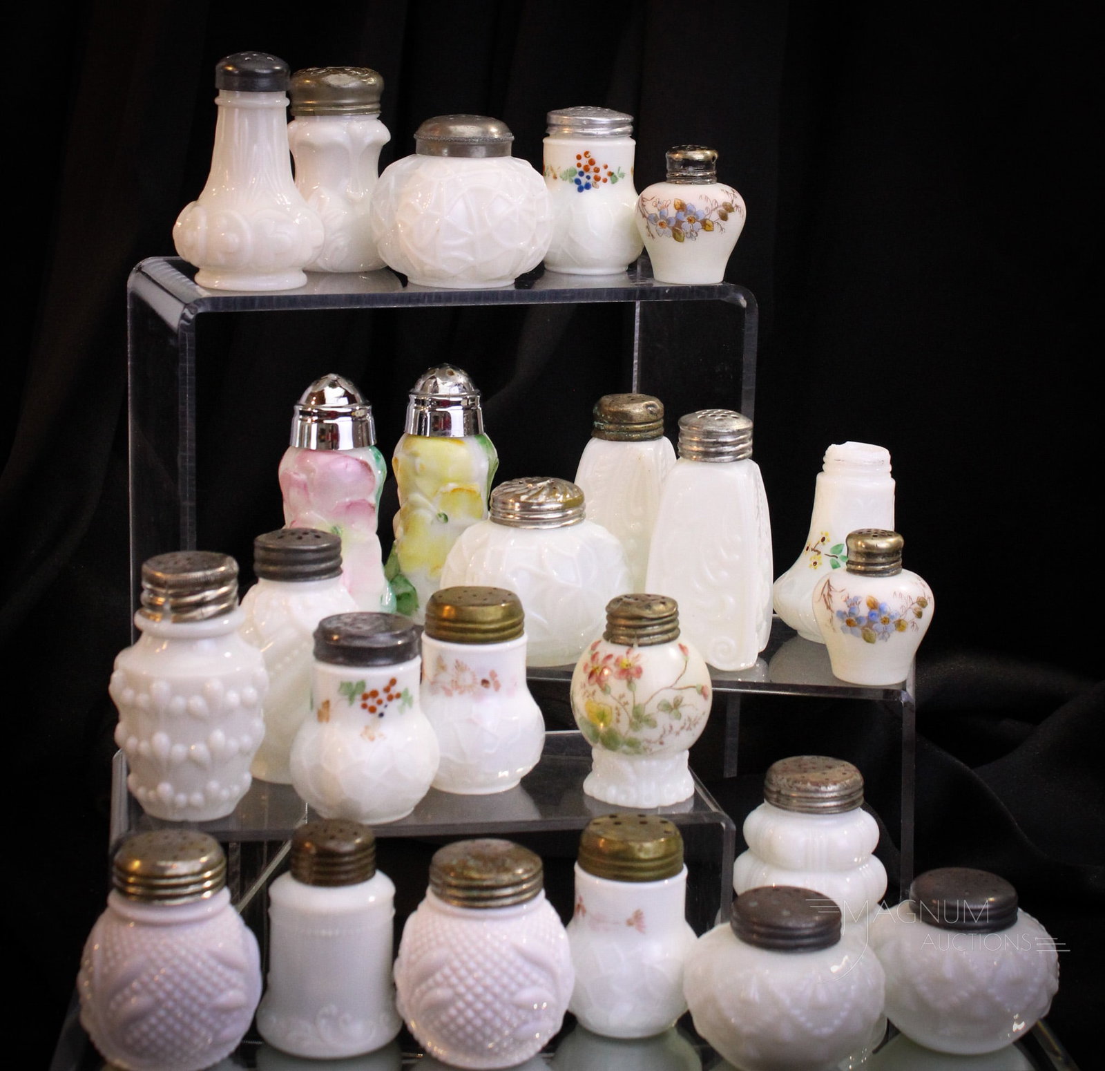 24 pc Lot Victorian Opal Glass Salt Shakers: Selections abound in this array of Victorian salt shakers. Included in this lot are eight matched pairs. One as nice as the next! Tallest measures 3 3/4".