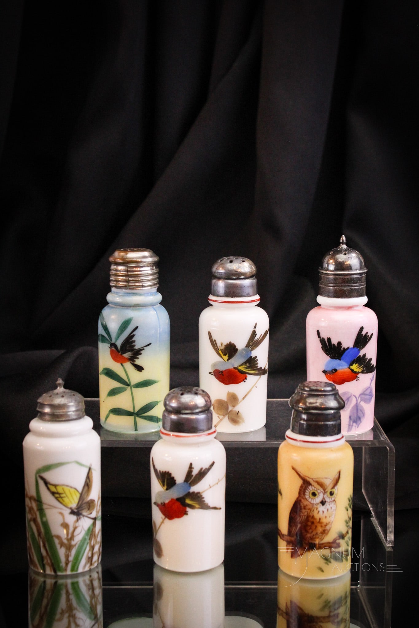 6 pc Lot Opal Victorian Glass Cylinder Salt Shakers: Six fine examples of opal glass cylinder Victorian salt shakers. Four with bird decoration, one with butterfly décor. The final is adorned with a kichy owl. Each measures 4 1/4".