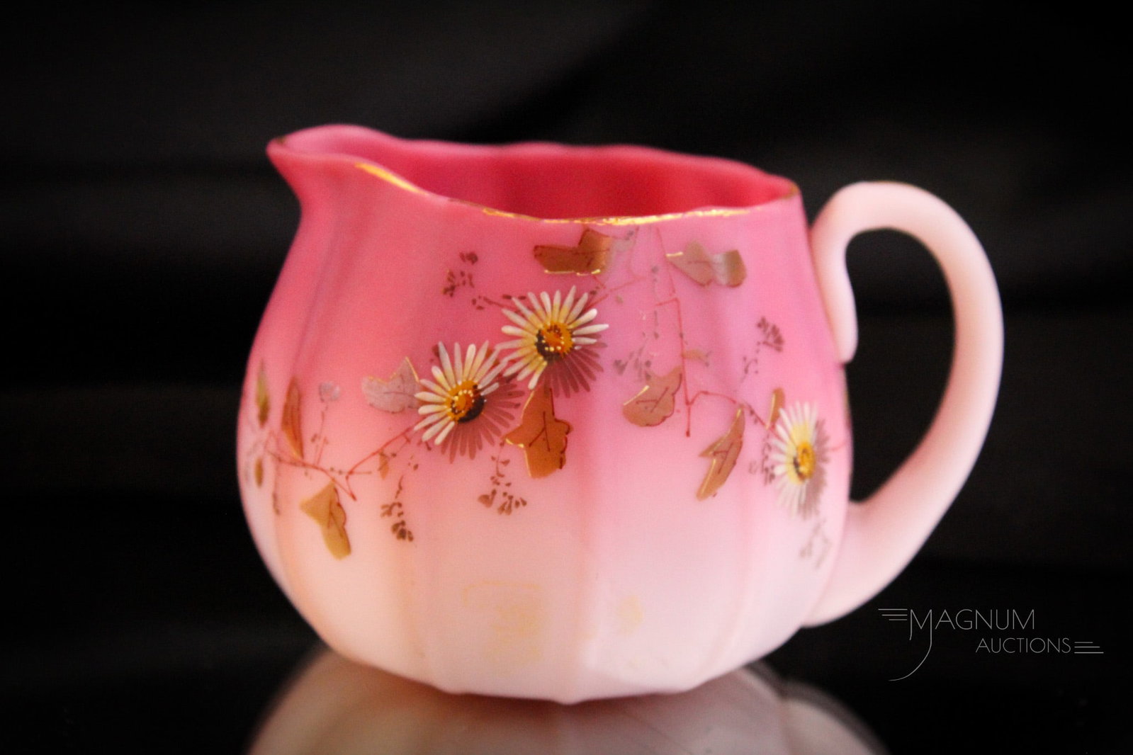 New England Libbey Peachblow Victorian Glass Decorated Creamer: Fanciful daisies decorate the body of this New England Libbey Peachblow Victorian cream pitcher. This great example stands only 2 1/2" tall. Very choice example.