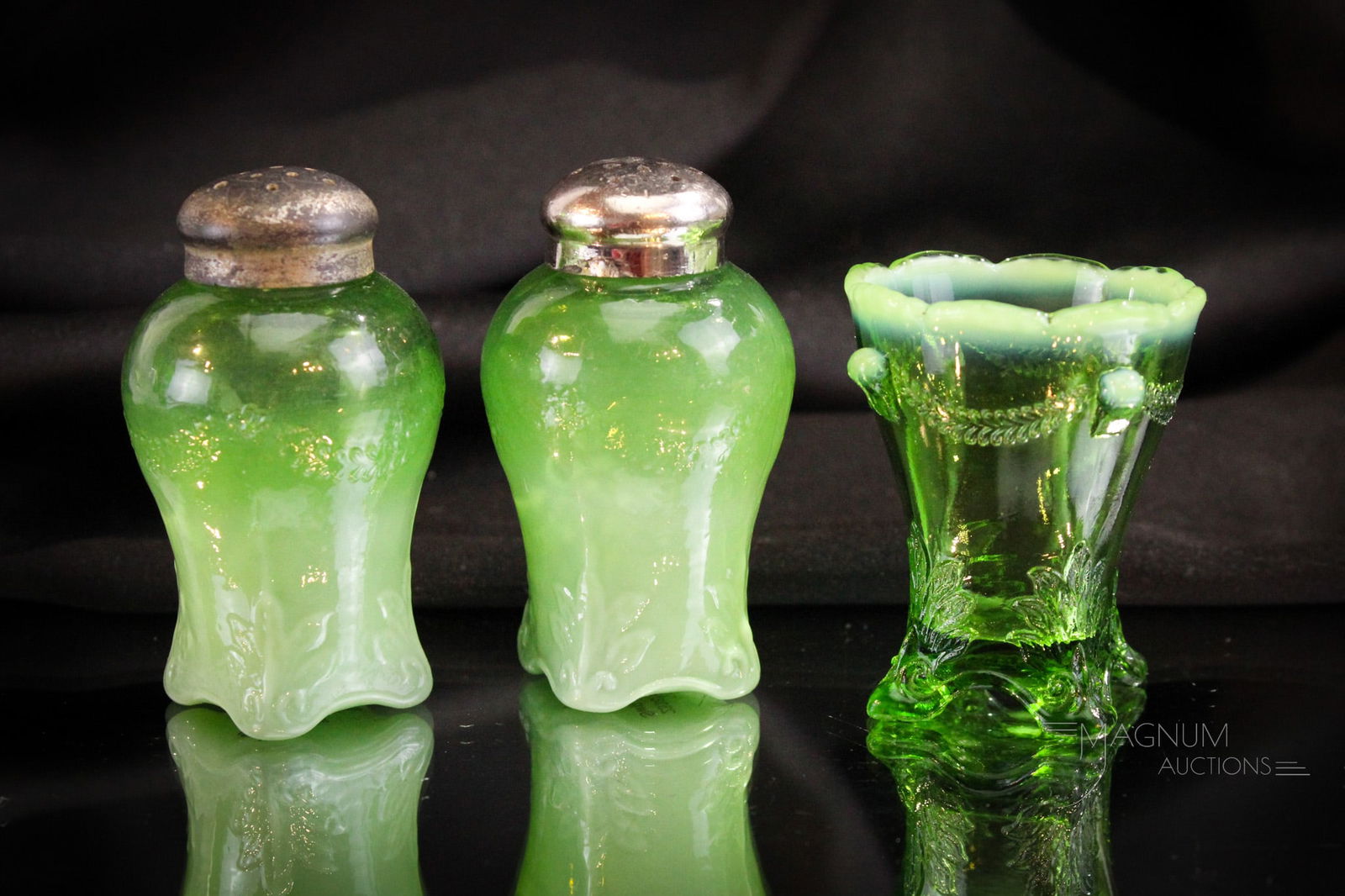 3 pc Lot Victorian Green Opalescent Jefferson Glass Shakers & Toothpick: Three lovelies in Victorian green opalescent Jefferson glass represented in this lot. A pair of shakers along with a toothpick holder. Tallest measures 3 1/4".