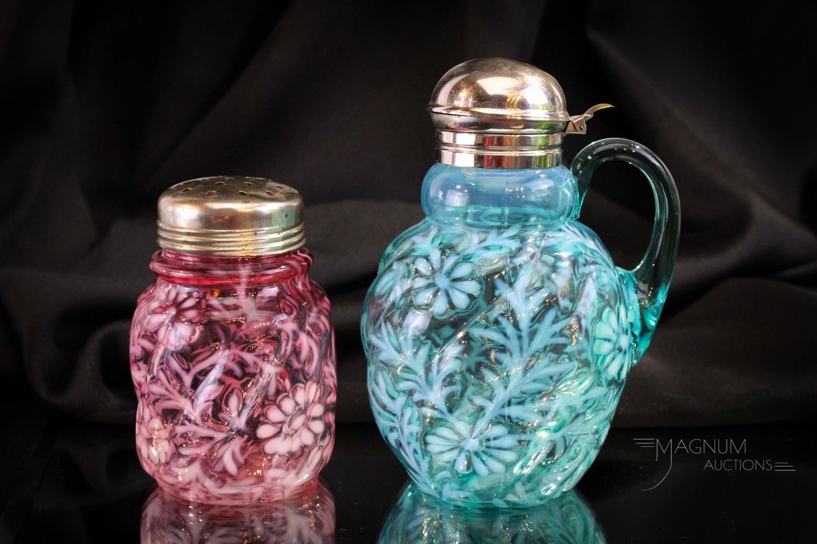 2 pc Lot Victorian Northwood Blue & Cranberry Opalescent Daisy & Fern Syrup & Sugar Shaker: Two Piece lot of Victorian Northwood Daisy & Fern in cranberry and blue opalescent. Featured in the lot is a syrup pitcher along with an ever-popular sugar shaker. Tallest measures 6 1/2" tall.