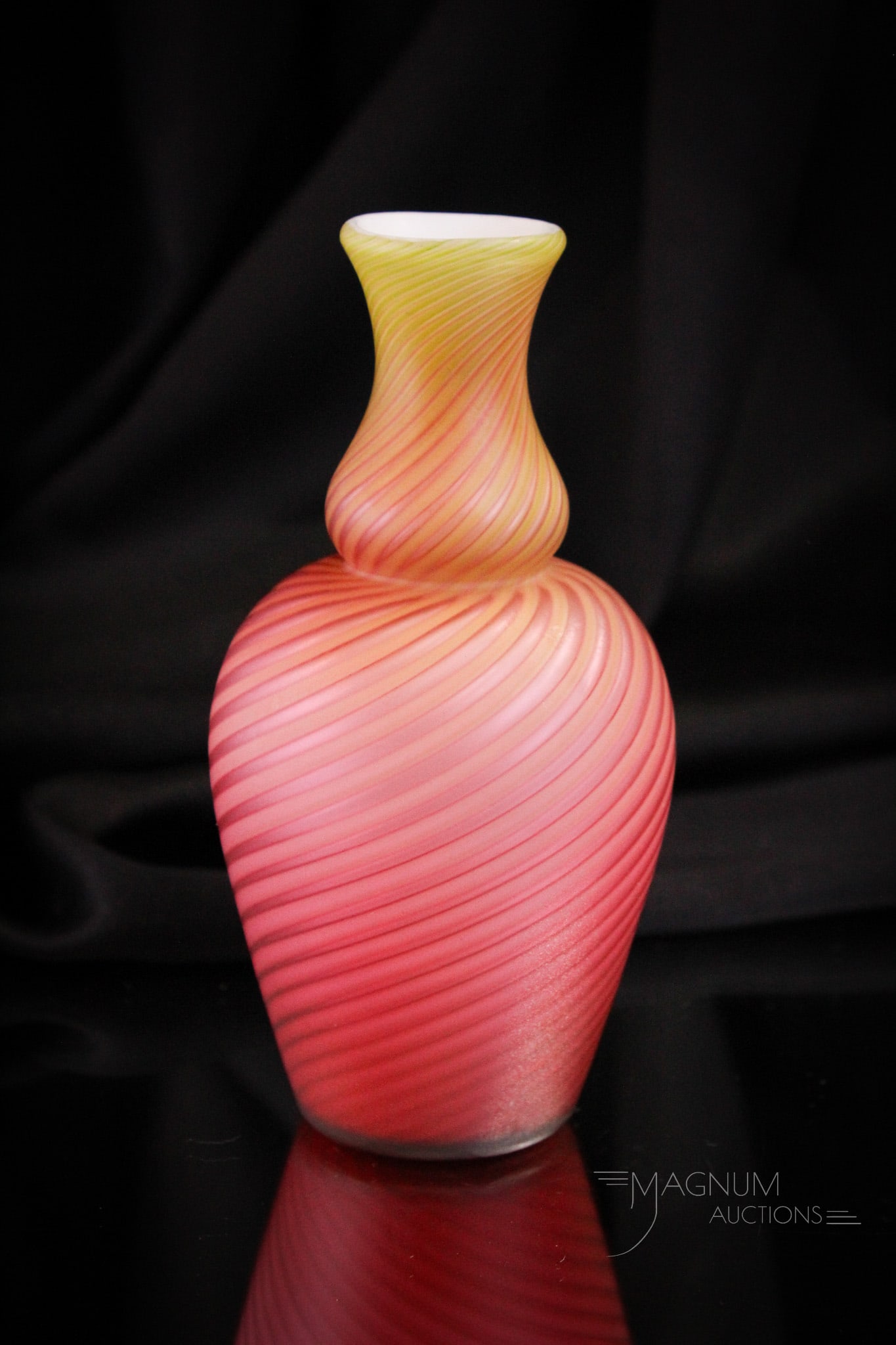 Stevens & Williams Glass Pompeiian Swirl Victorian Vase: Fabulous Victorian Stevens & Williams glass Pompeiian Swirl pattern vase. This vase shaded from rasberry to green is marvelous. It measures 6 3/4" tall.