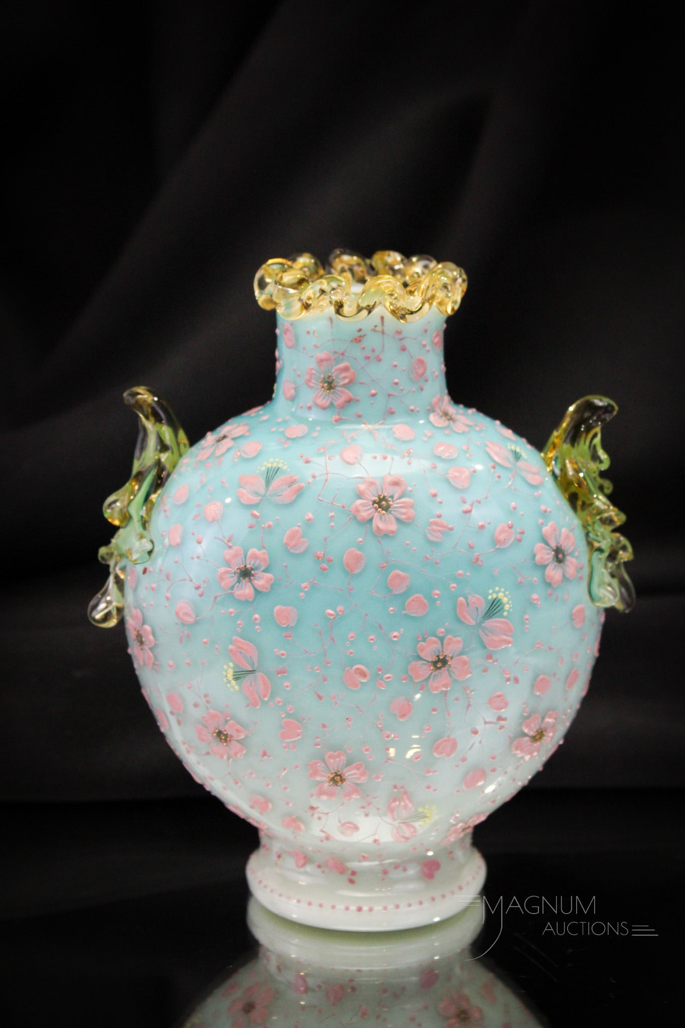 Harrach Blue Enameled Victorina Cabinet Size Pillow Vase: Wonderful attributed to Harrach glass powder blue cased glass cabinet size pillow form vase. Vase features applied stump handles and trim in amber applied glass. This fine piece measures a small 7" hi