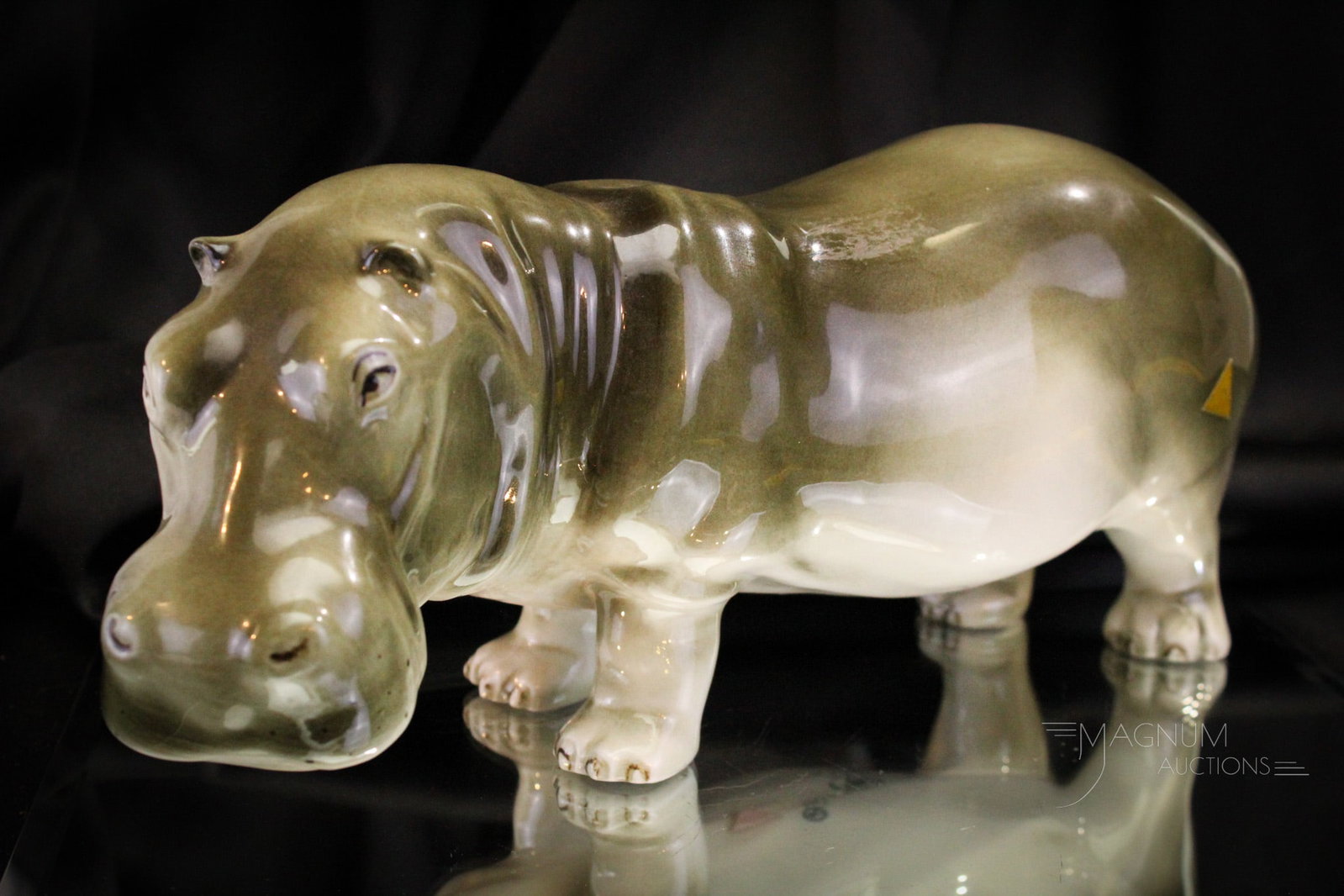 Royal Dux Porcelain 13" Hippopotamus Figurine: Charming Royal Dux porcelain hippopotamus figurine. Henrietta the Hippo measures in at 5 1/2" tall, 13" long. And full of whimsical charm.
