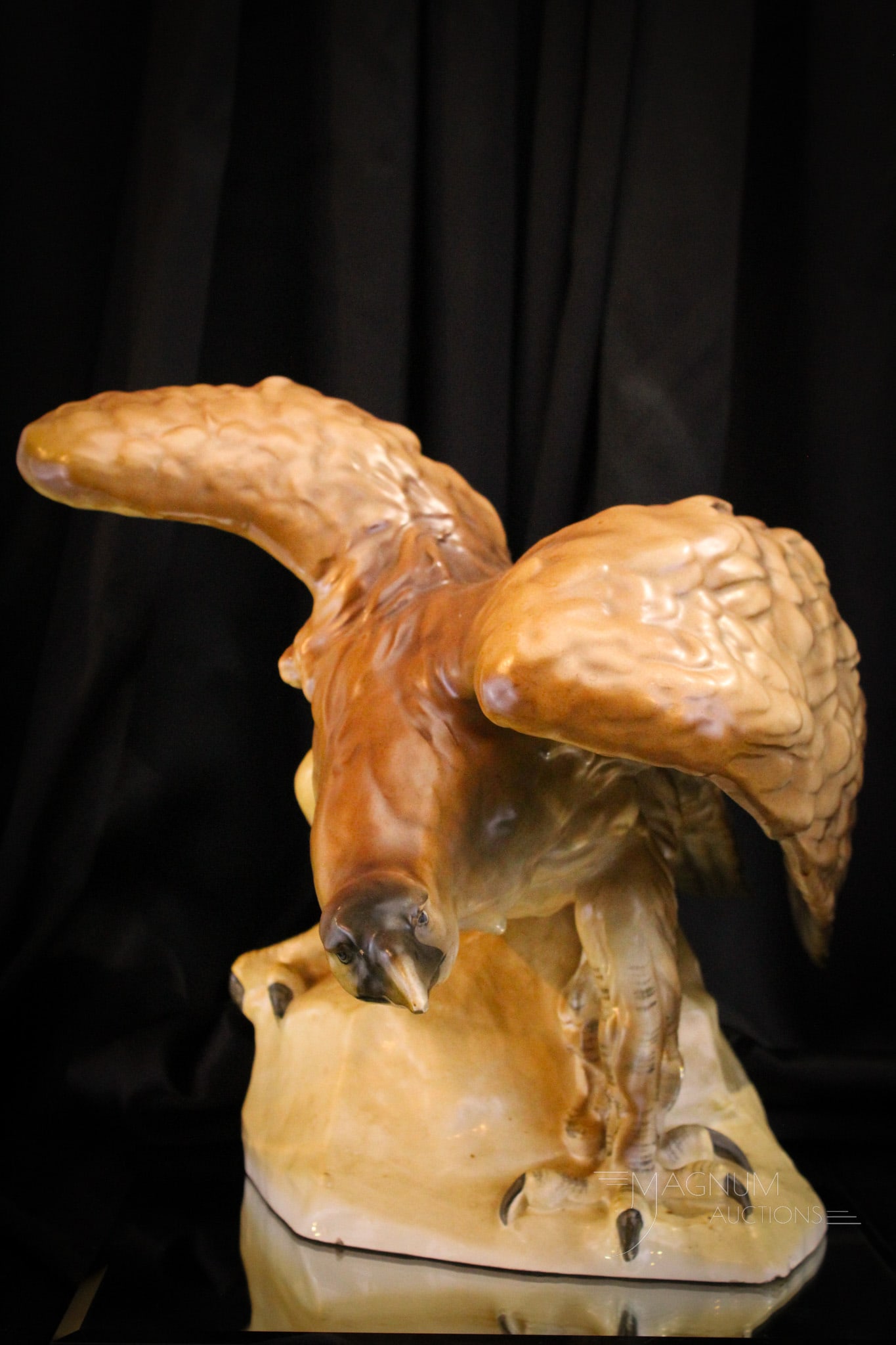 Royal Dux Porcelain Massive Golden Eagle Figurine: Massive Royal Dux Porcelain Golden Eagle figurine. This large piece measures a whopping 13" tall, 18" long. Minor as made inner rim flakes as shown. Provenance: This item is from the private collectio