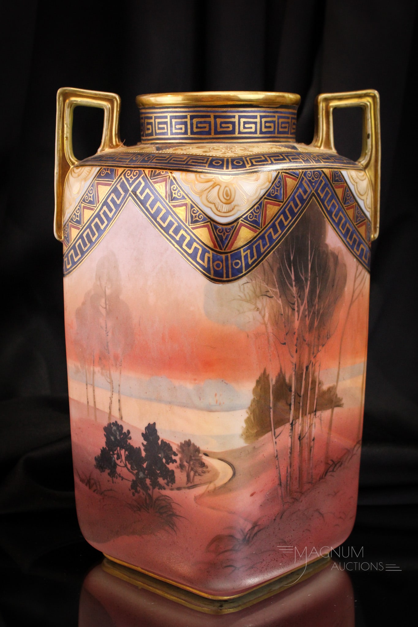 Nippon Porcelain Double Handle Scenic Vase: Select offering of a Nippon signed Porcelain double handle vase featuring scenic decoration. Wonderful size at 11" tall.