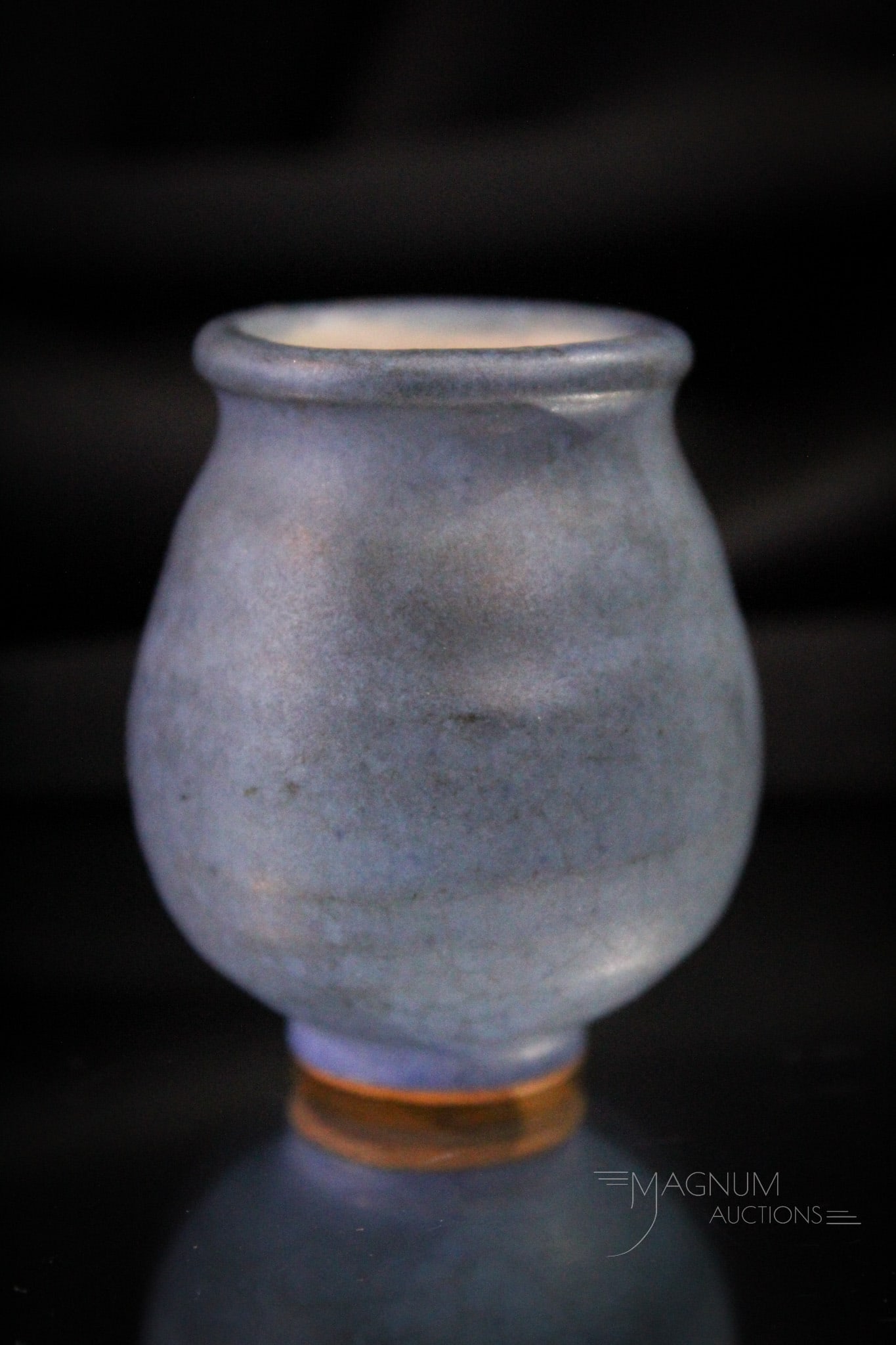 Newcomb Pottery Miniature Matte Blue Cabinet Vase: Select example of a Newcomb pottery miniature cabinet vase in matte blue. Vase measures 2" tall.