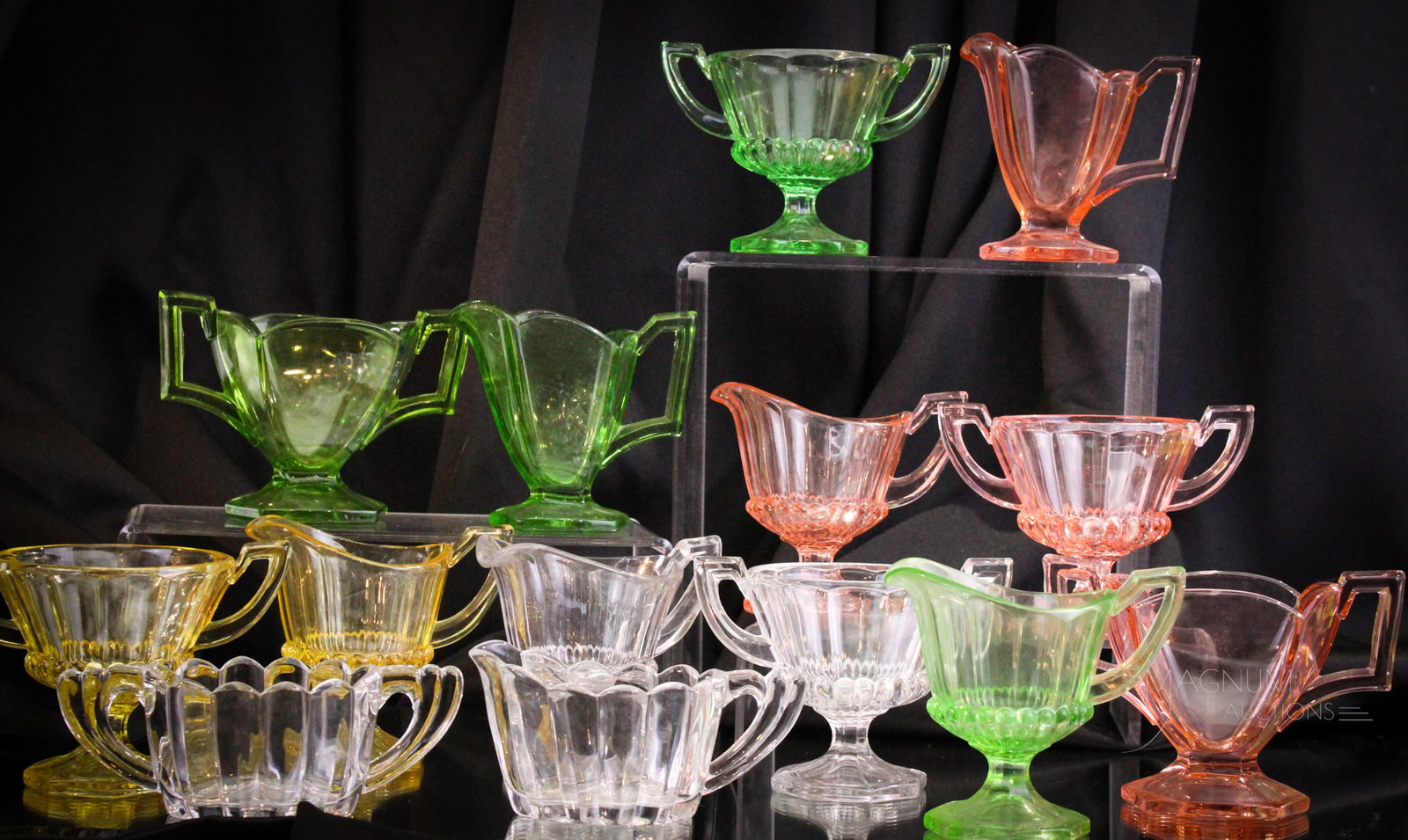 14 pc Lot Heisey Glass Creamer & Sugar Sets: Seven complete sets of the ever-popular Heisey glass creamer and sugar sets. All in a plethra of rainbow colors to include such fan favorites as Moongleam, Sahara, Flamingo, and the increasingly popul