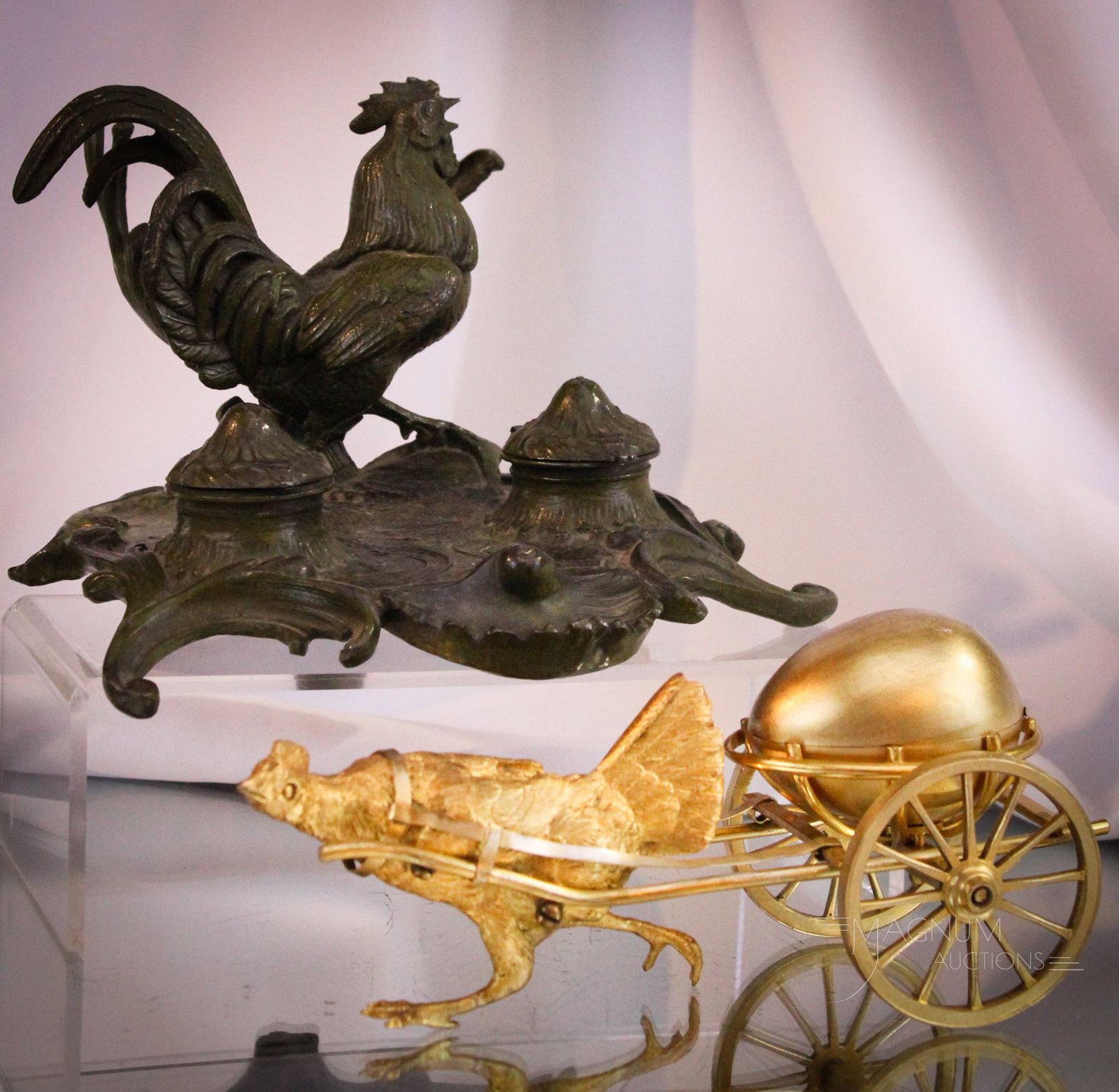 2 pc Lot Chicken Rooster Themed Victorian Inkwells: Here is a two piece lot of Victorian figural chicken and rooster inkwells. The first is a figural Rooster with pen rest behind it. Pen rest exhibits minor losses to adornments. The second is a gilt ra