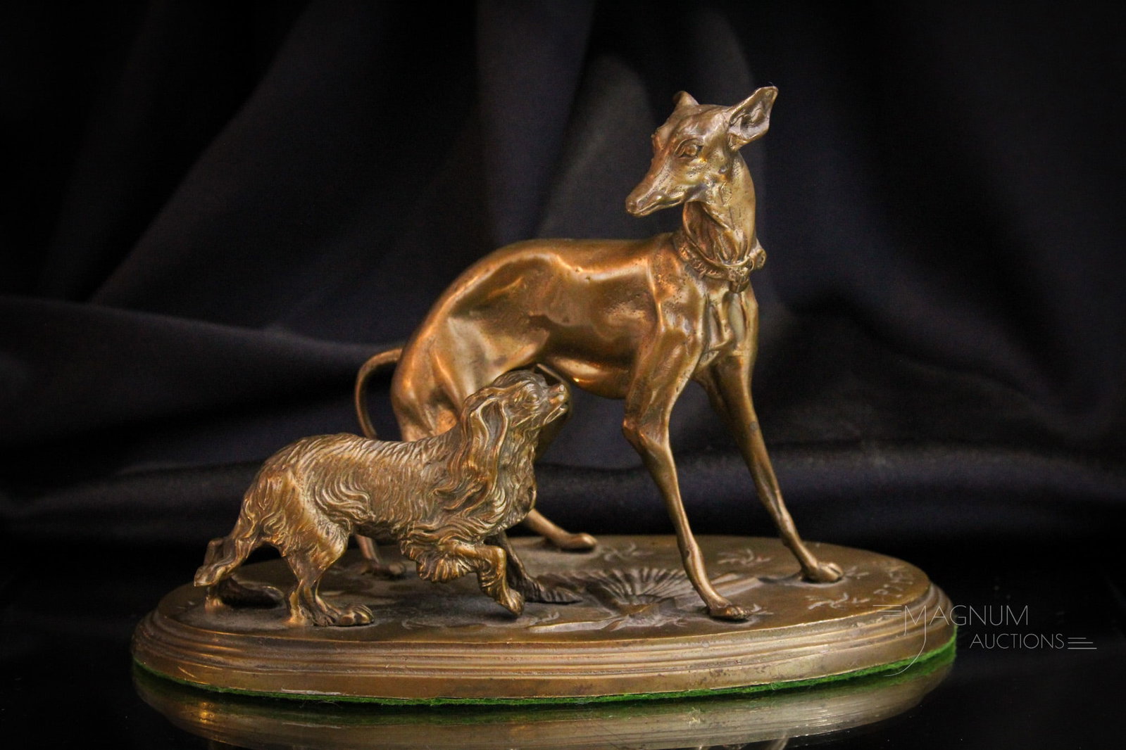P.J. Mene Bronze Greyhound & Spaniel: Nice find in this P. J. Mene bronze of a greyhound and spaniel. Bronze measures 6 1/4" tall, 9" long.