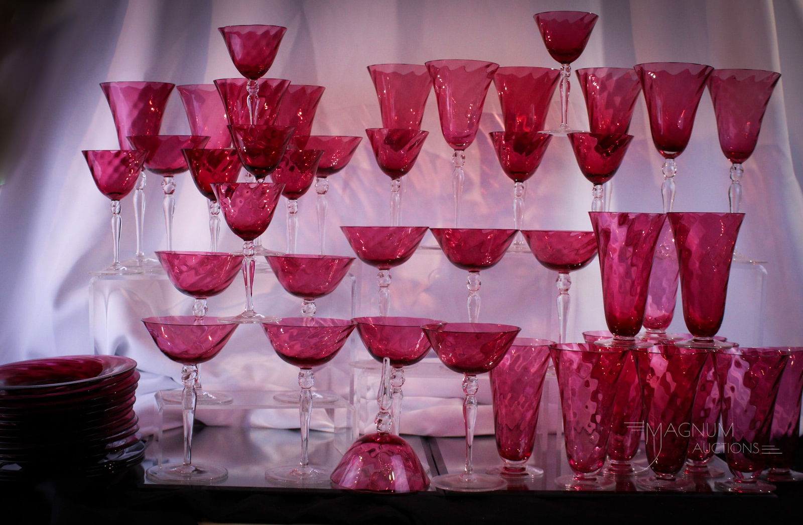 Huge 55 pc Lot F. Schmidt Garda Rose Cranberry Swirl Optic Glass Set: Wonderful offering of 55 pieces of F. Schmidt Garda cranberry or rose swirl optic glass. Lot is comprised of 10 water goblets, 11 champagne stems, 12 footed tumblers, 10 clarets, a bell, and also 11 s