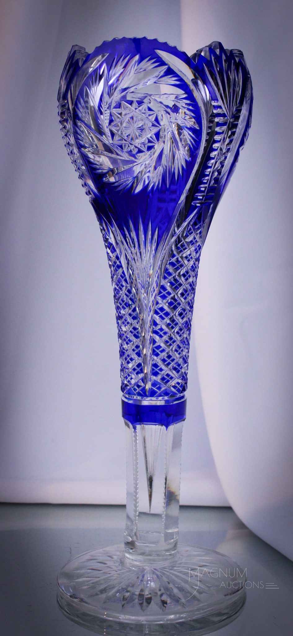 Cobalt to Clear Cut Glass Pinwheel & Cane 12" Vase: A cobalt blue cut to clear Pinwheel and Cane pattern 12" tall vase. Brilliant blue color.