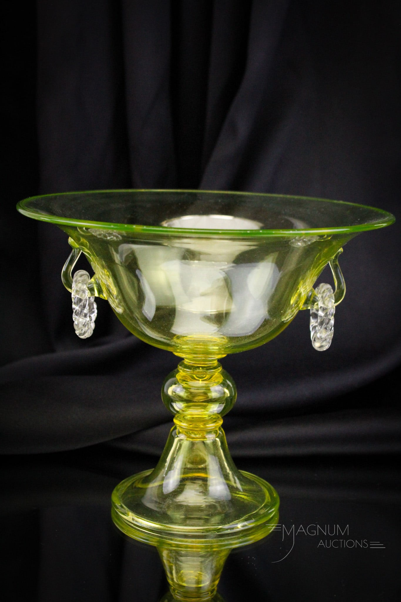 Steuben Topaz Vaseline Glass Ring Handle Console Bowl: Super find in this Steuben Topaz vaseline glass console bowl with applied ring handles. Piece measures 7" tall, 8 1/4" in diameter.