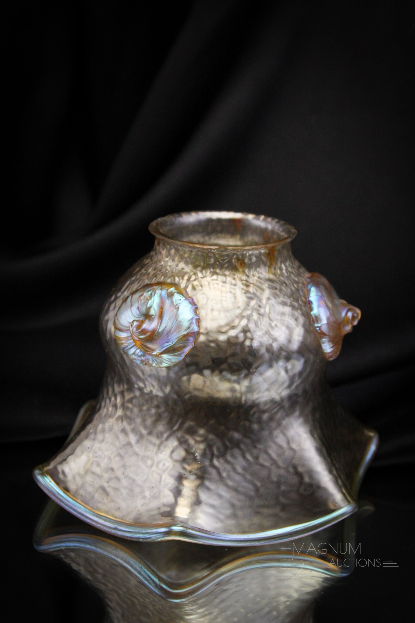 Loetz Art Glass Irridescent Shade: Great find in this art glass Loetz irridescent textured body art glass shade. Shade has applied prunts and gold rim. Piece measures 4" tall, and has a 2 1/8" fitter rim.