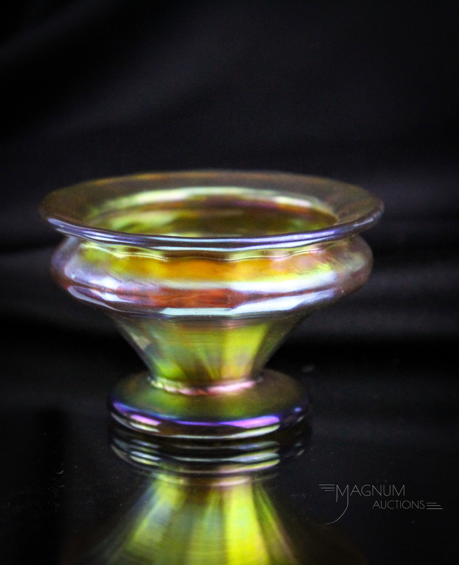 Signed Tiffany Gold favrile Footed Open Salt: Charming little perfect piece of signed Tiffany Favrile art glass in the form of an open salt. This little guy measures 1 7/8" tall to the rim. Piece is signed, "L.C.T., Tiffany Favrile." Provenance: 
