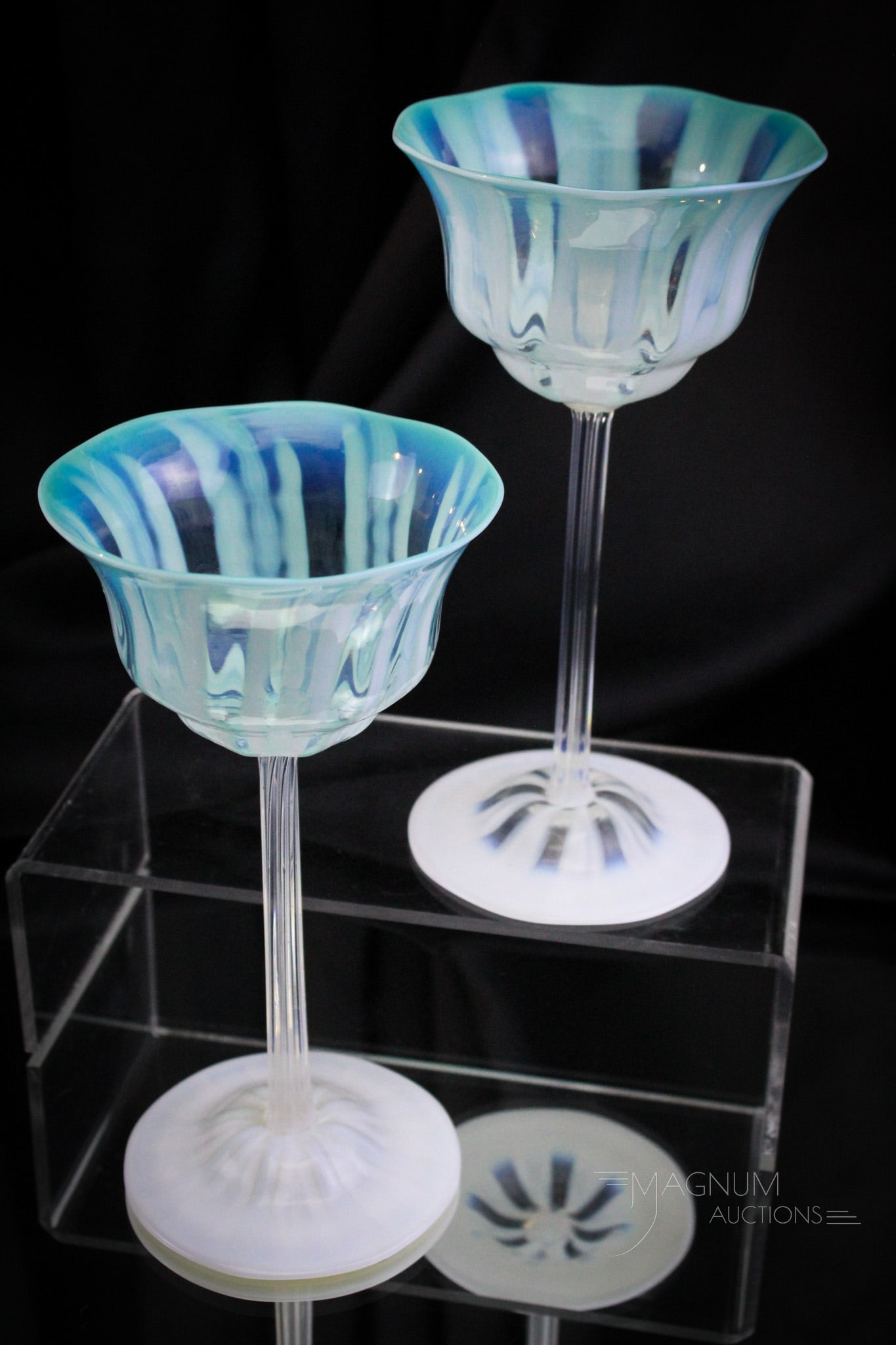 Signed Tiffany Favrile 2 pc Lot Green Pastel Opalescent 7 1/2" Stems: Another select offering of two fine examples of pastel opalescent Tiffany Favrile art glass green stems. Each measures 7 1/2" tall. Each is signed, "L.C.T., Favrile."