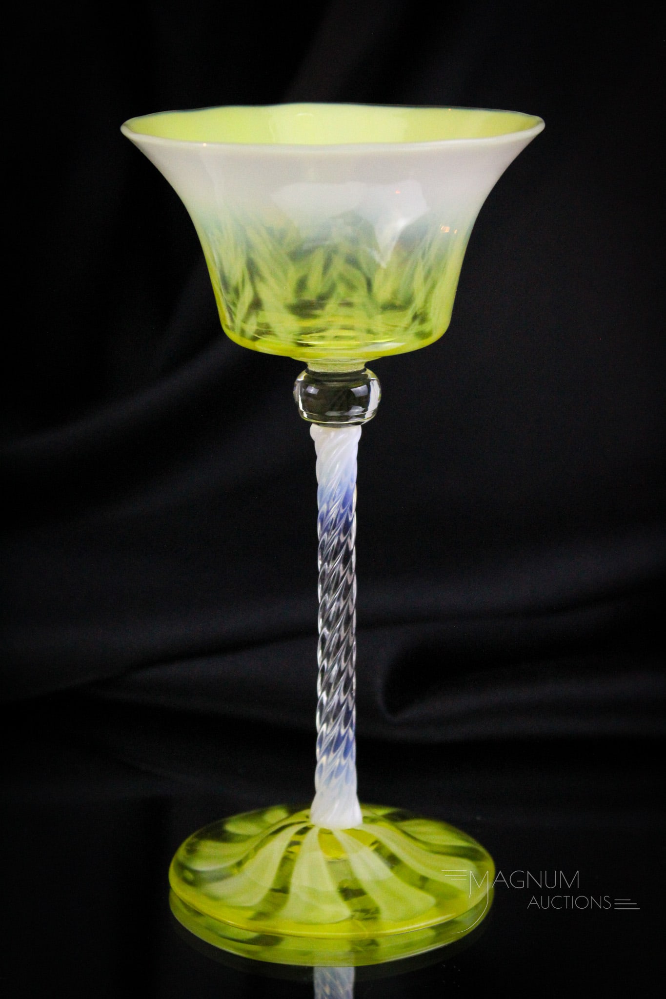 Tiffany Pastel Favrile Opalescent Yellow 6 3/4" Stem: Fine select example of a yellow opalescent pastel Tiffany art glass stem. Piece is unisgned. Stem measures 6 3/4" tall.