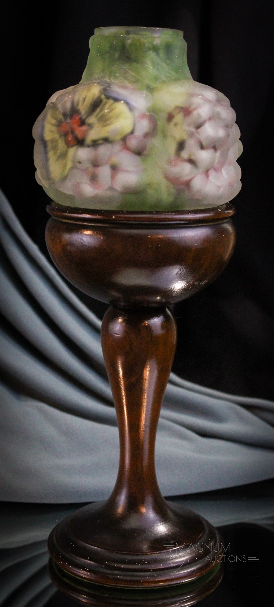 Pairpoint Puffy Votive Candle Lamp with Mahogany Base: Select find in this Pairpoint puffly lilac form shade complete with original mahogany wood base. Complete lamp measures 10 1/4" tall. Damage and restoration found on the rim of the shade not seen when