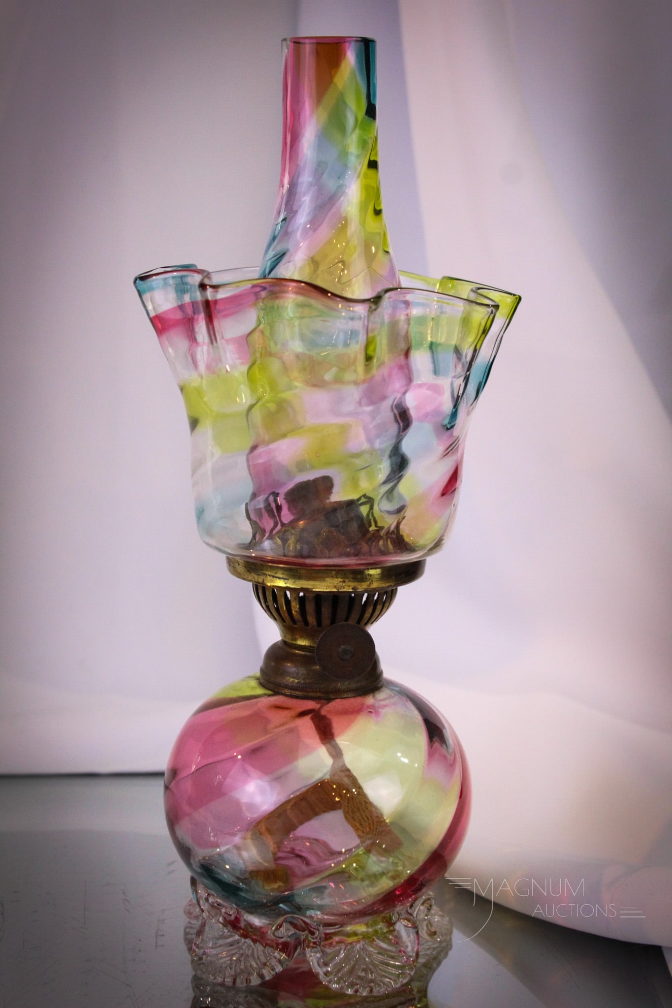 Very Rare Rainbow Victorian Minature Oil Lamp: Exceptionally rare museum find in this Victorian rainbow glass miniature oil lamp. Lamp base, shade and CHIMNEY are all rainbow. Unheard of. This fine lamp is a pinnacle in any collection. Make it you