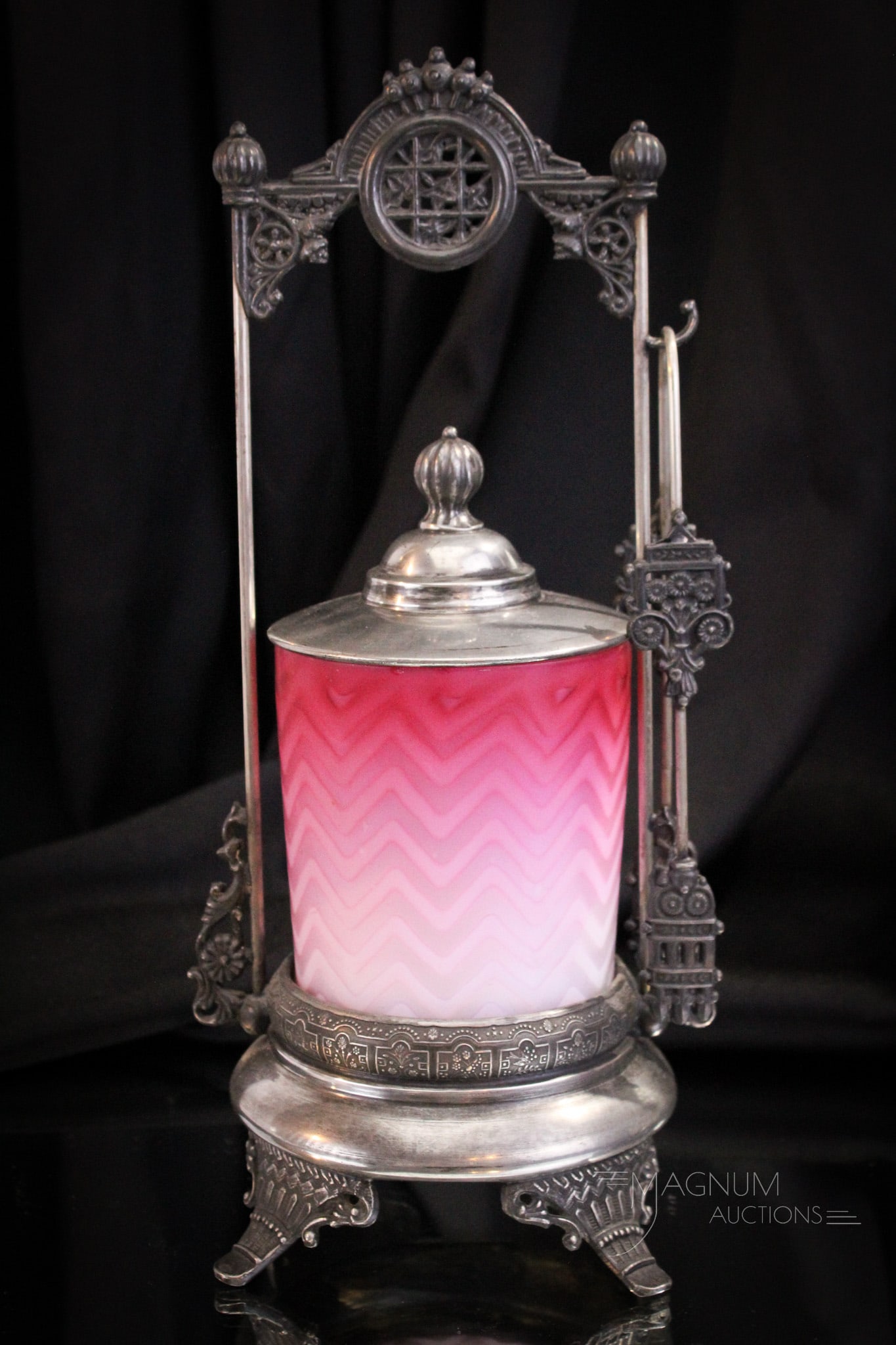Victorian Silverplate Pink Herringbone Mother of Pearl Satin Glass Pickle Castor: Superb find in this Victorian silverplate and glass Mother of Pearl herringbone pattern pickle castor. Frame is marked but illegible. Glass insert is a lovely deep pink shaded satin glass in a herring