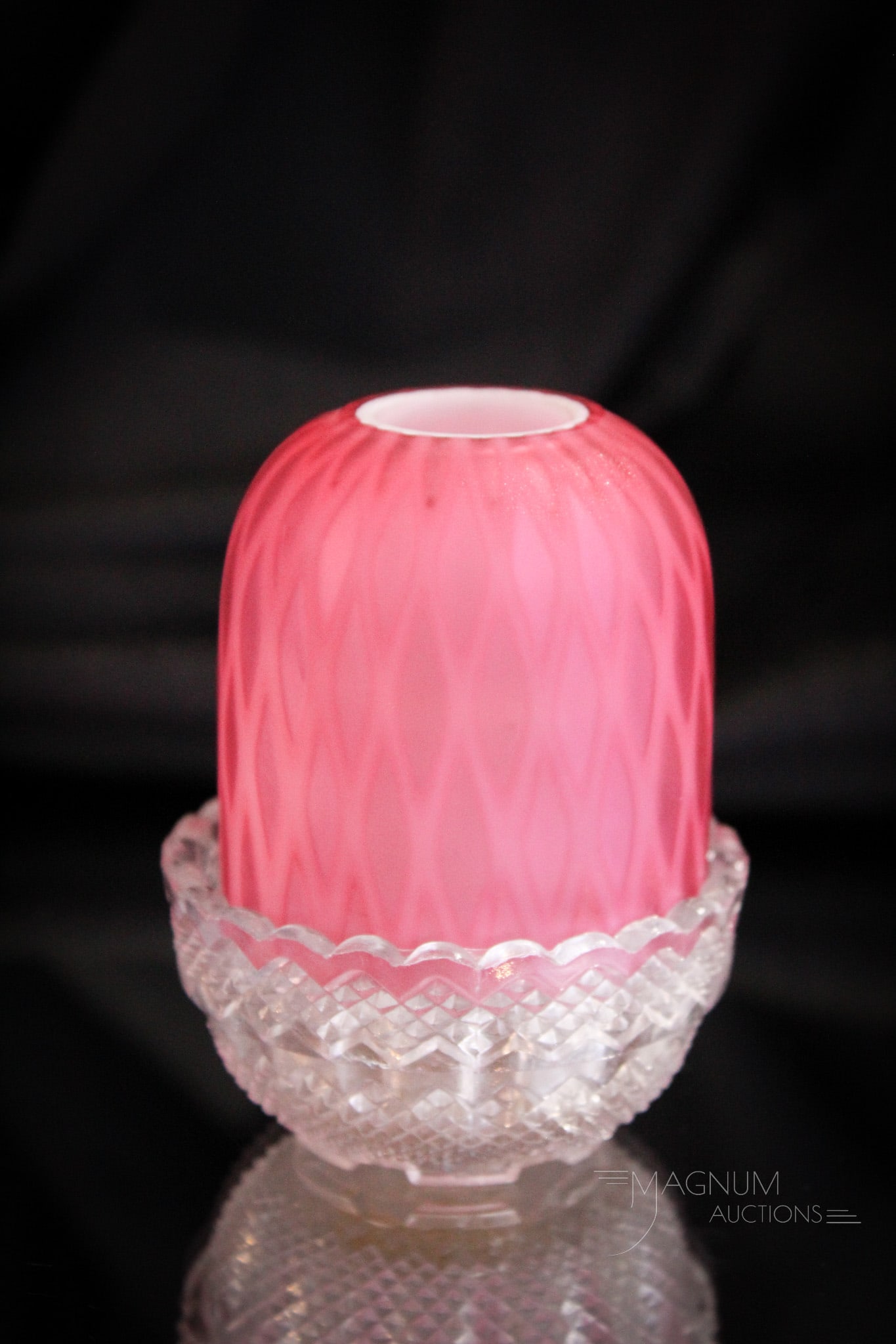 Victorian Mother of Peal Satin Victorian Glass Fairy Lamp: Select example of a pink diamond quilt fairy lamp on a signed Clarke'sbase. This one with nice pink coloring. Complete lamp measures 5 1/4" tall. Chip on one foot of the base as shown.
