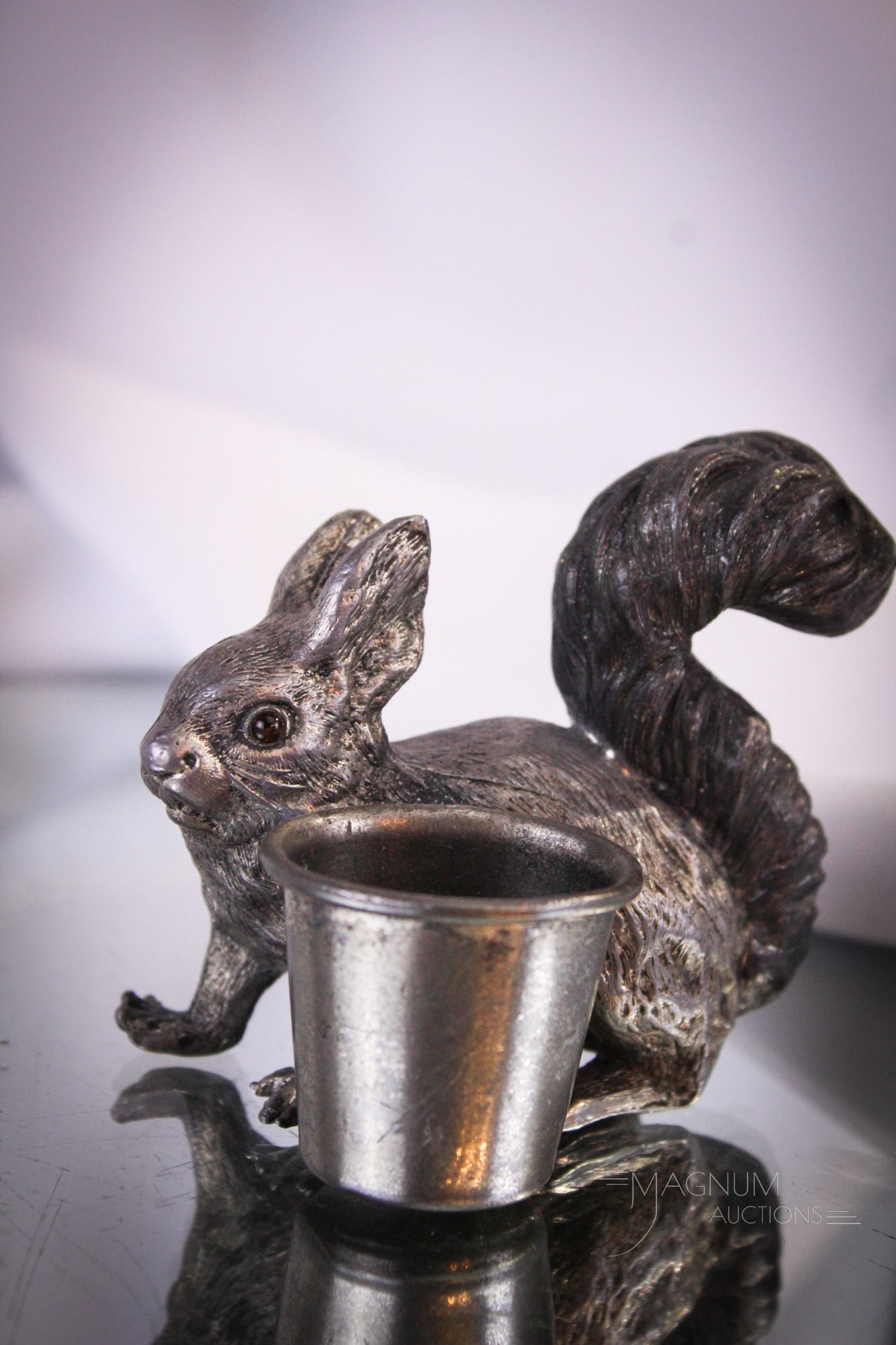 Victorian Silverplate Figural Squirrel Toothpick Holder: Charming little figural squirrel Victorian toothpick holder. This little charmer has glass eyes. He measures 3" tall.
