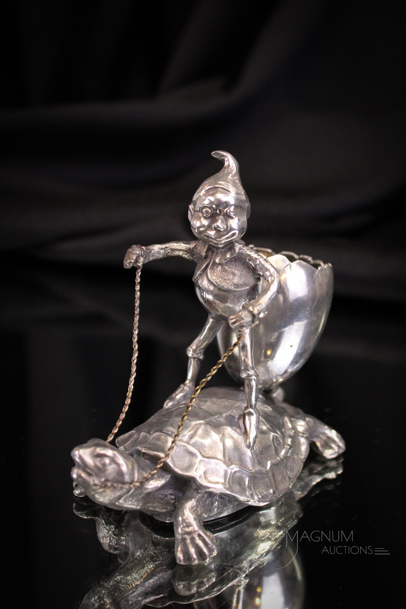 Pairpoint Silverplate Palmer Cox Brownie on Turtle Toothpick Holder: An incredible piece of Victorian silverplate featuring a Palmer Cox Brownie on the back of a turtle holding an umbrella in the form of a toothpick holder. Aren't these little brownies cute? This one r