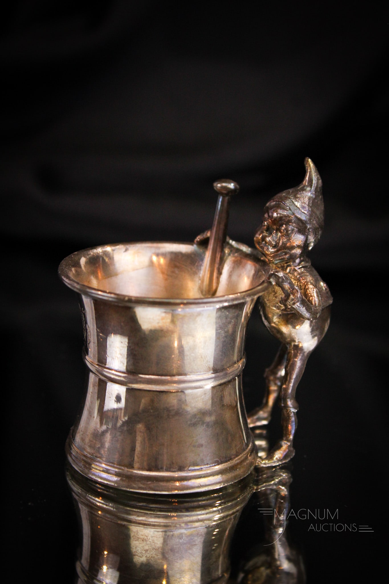 Pairpoint Palmer Cox Brownie Victorian Toothpick Holder: This little signed Pairpoint silverplate Victorian toothpick holder features a brownie looking in a cup. Impish smile on his face. This piece measures 2 3/4" tall.