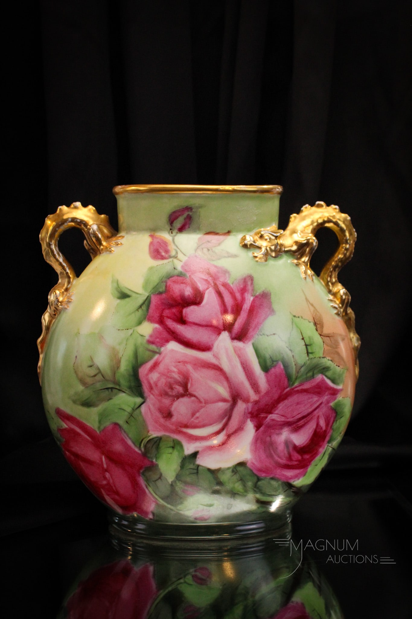 J.P.L. France Artist Signed Roses Dragon Handle 10" Vase: Beautiful artist signed and marked, "J.P.L., France" pillow vase featuring dragon form handles and decorated with roses front and back. This vase measures 10" tall, and 10" wide.